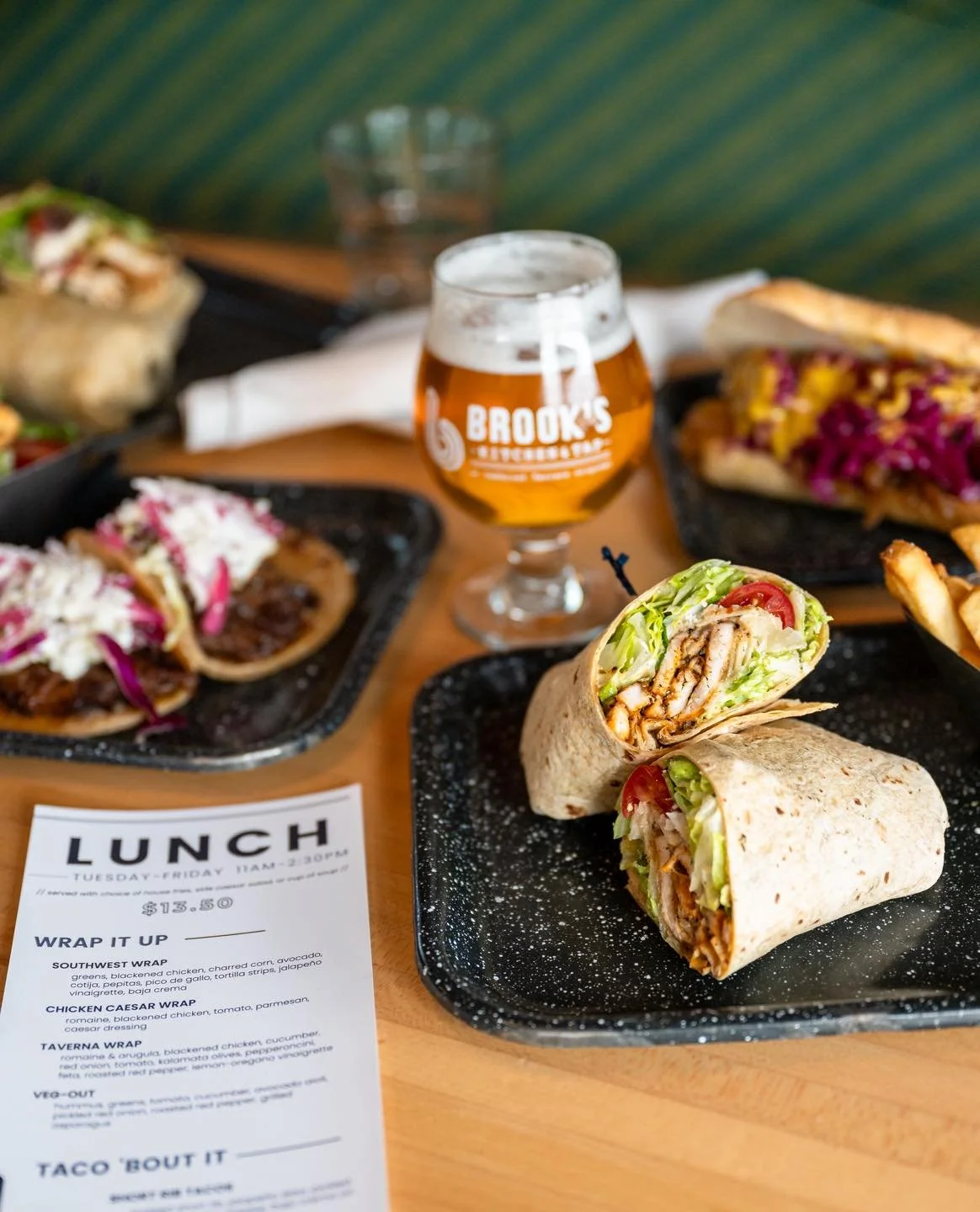 📲 𝗟𝘂𝗻𝗰𝗵 𝗶𝘀 𝗰𝗮𝗹𝗹𝗶𝗻𝗴 -- answer with a mid-day break at Brook's Kitchen &amp; Tap! From our smoked sausage sandwich to our signature wraps, we have everything you need for a most delicious part of your day! 

✨ Lunch menu available Tuesda