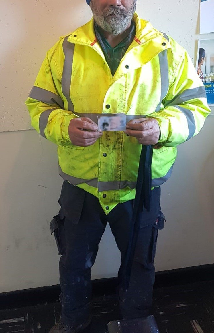 Client Muthan collecting his BRP Card from our Southall office.