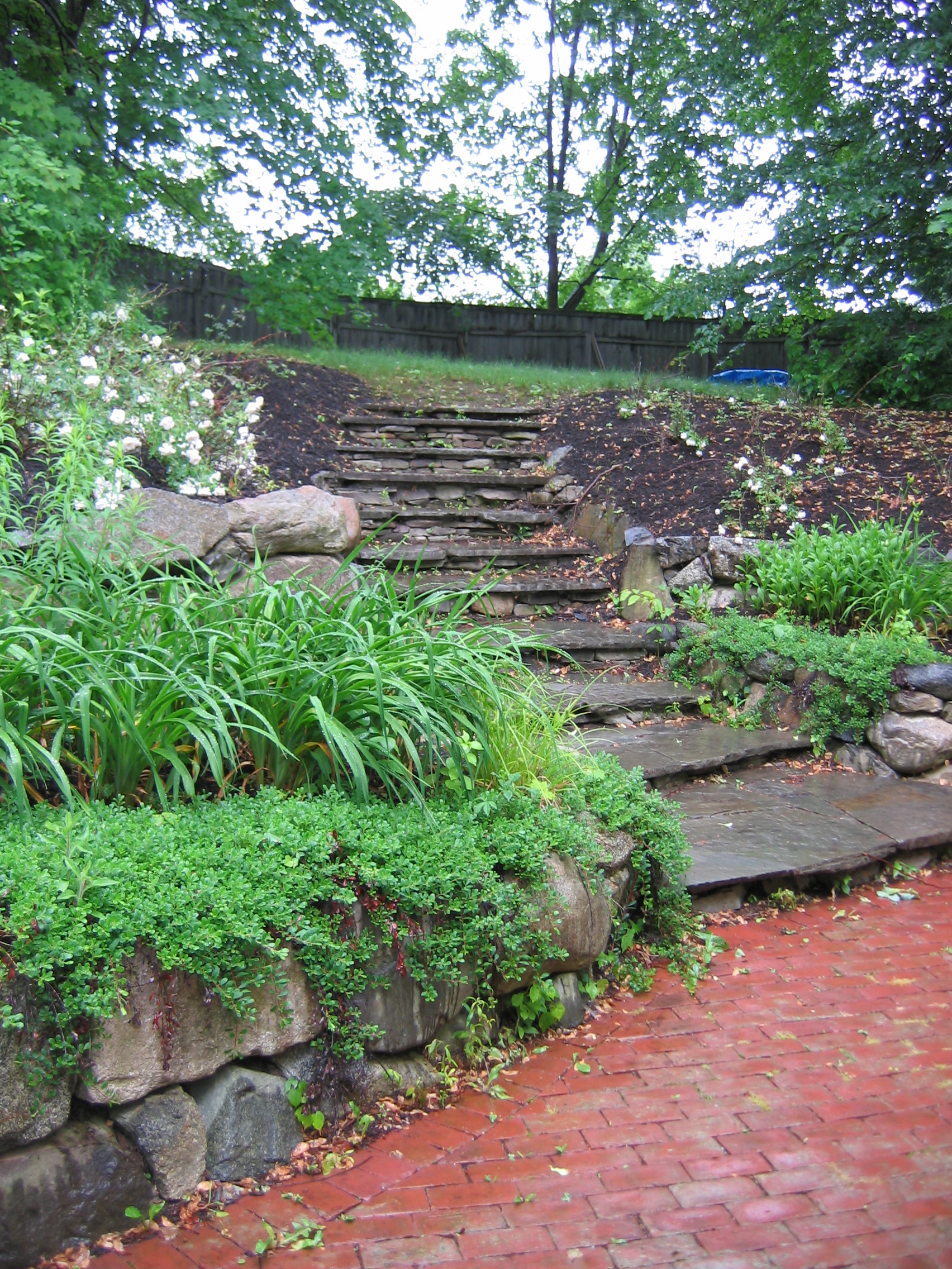 Irregular Bluestone Treads set on Field Stone Risers.JPG