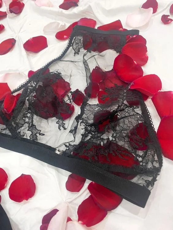 black bralette w rose petals.jpeg