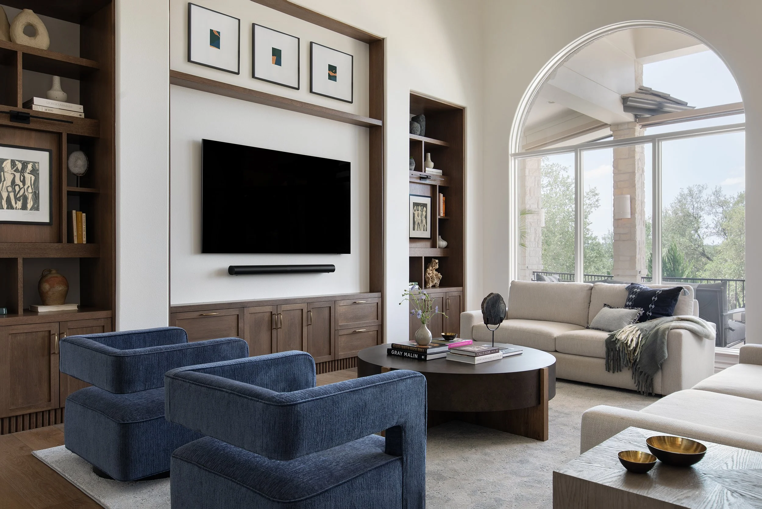 The Falls Residence living room design Etch Design Group, residential interior design photography by Avery Nicole Photography and located in Austin, Texas