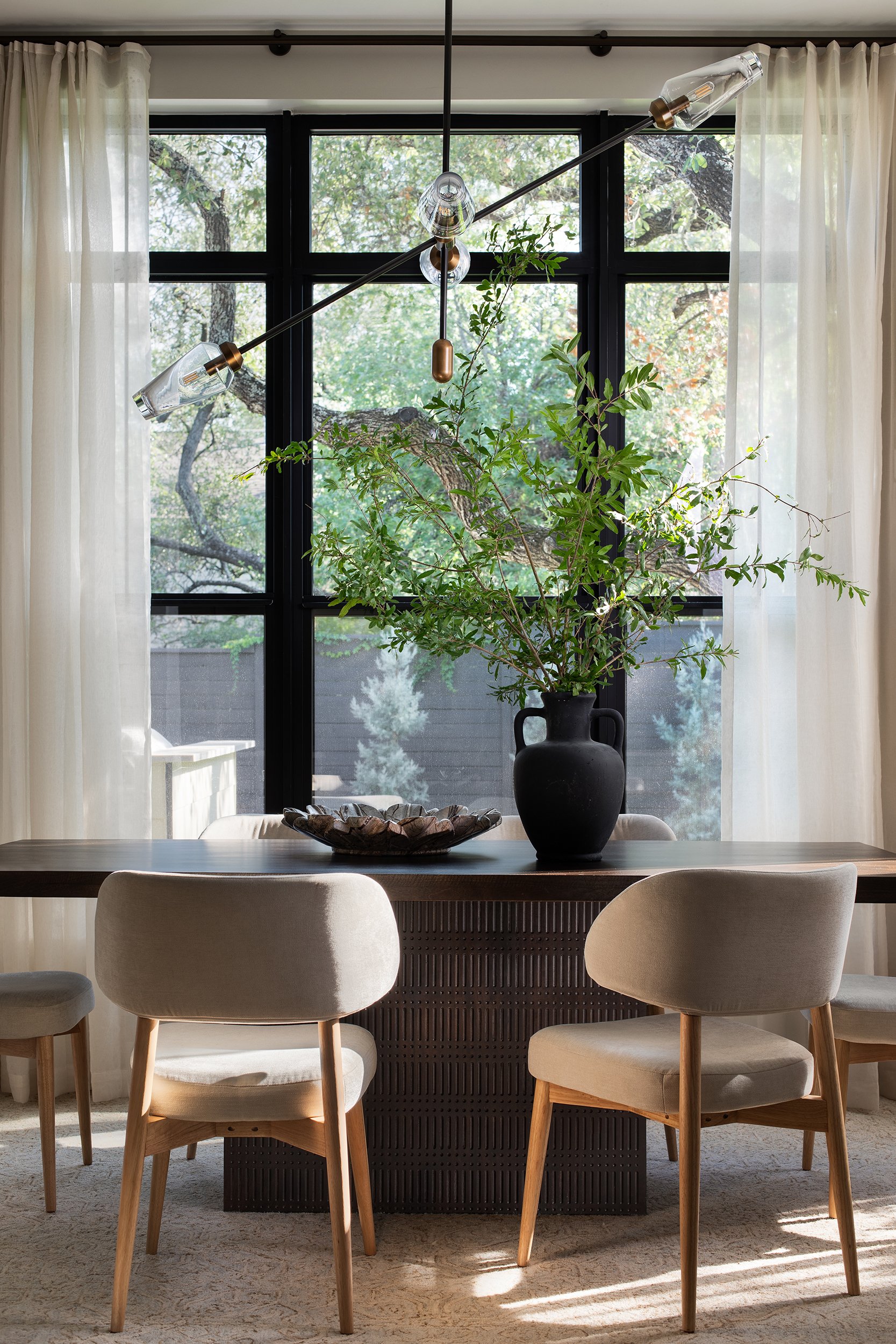 Bamford residence dining room interior design by Spaces Designed, residential photography by Avery Nicole Photography and located in Austin, Texas