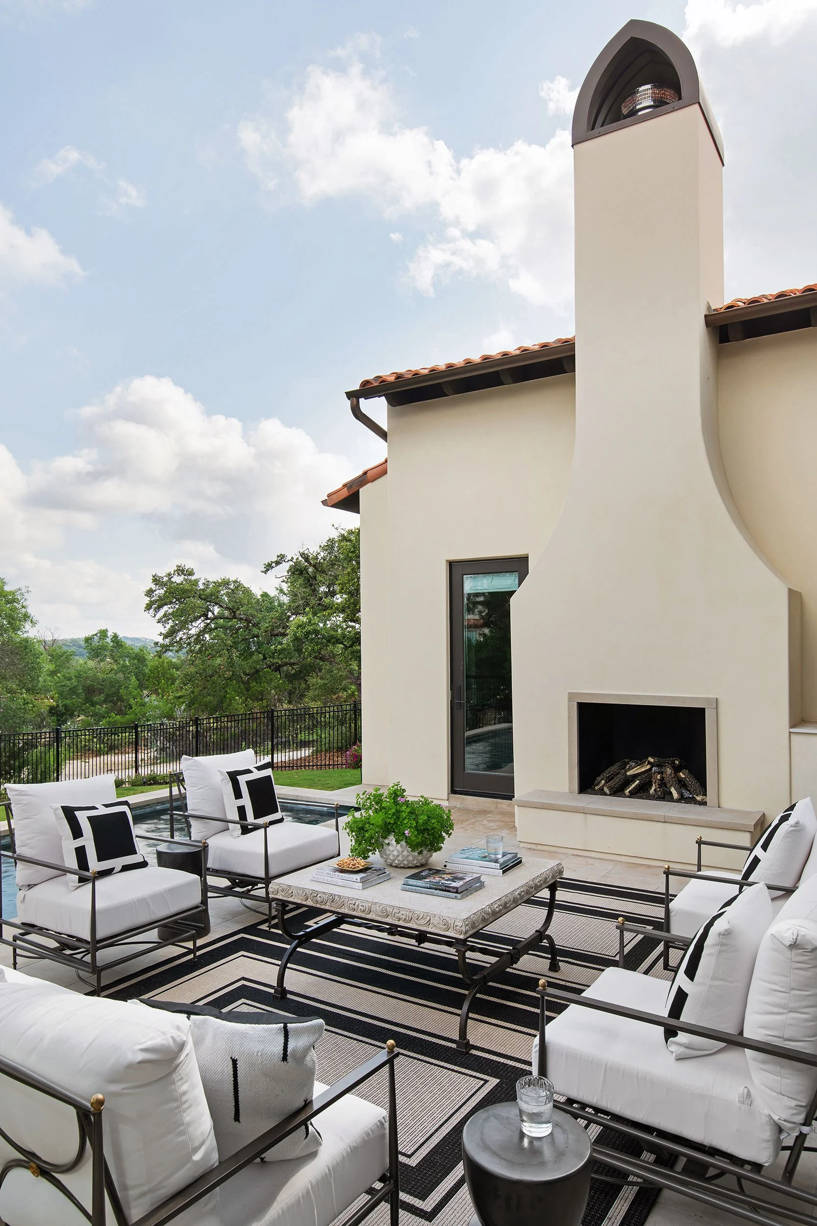 Back exterior from the Amarra Villas project, designed by Heather Scott Home & Design, Austin Texas, photography by Avery Nicole Photography
