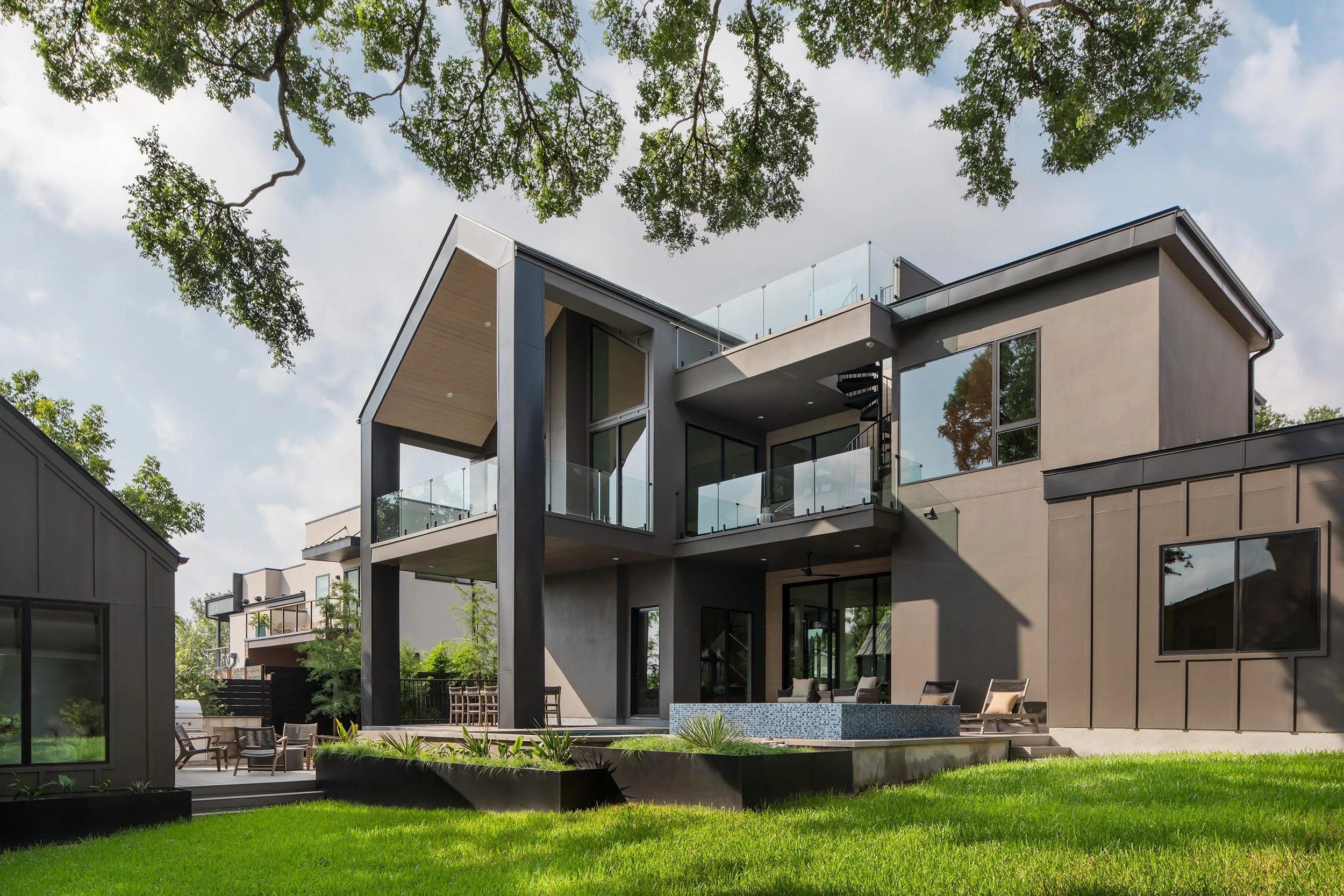 Back exterior from the Taylor Gaines Project, designed by Etch Design Group, Austin TX, photography by Avery Nicole Photography