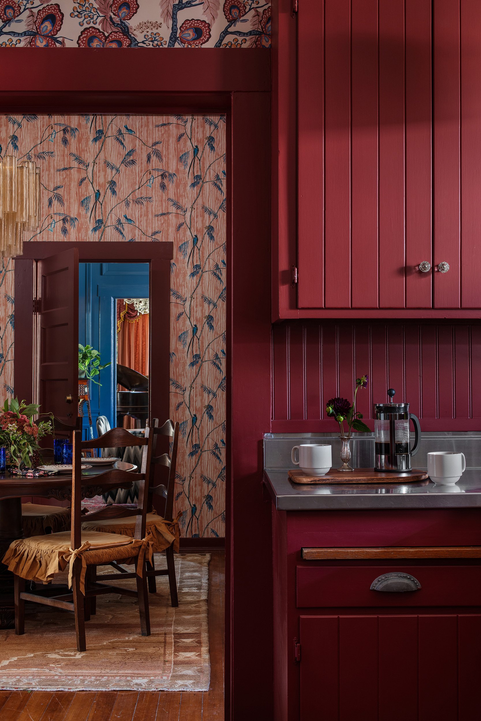 The Menagerie luxury boutique hotel the rapture mansion kitchen into dining room design by Sarah Stacey Interior Design. Photography by Avery Nicole Photography and located in Fredericksburg, Texas