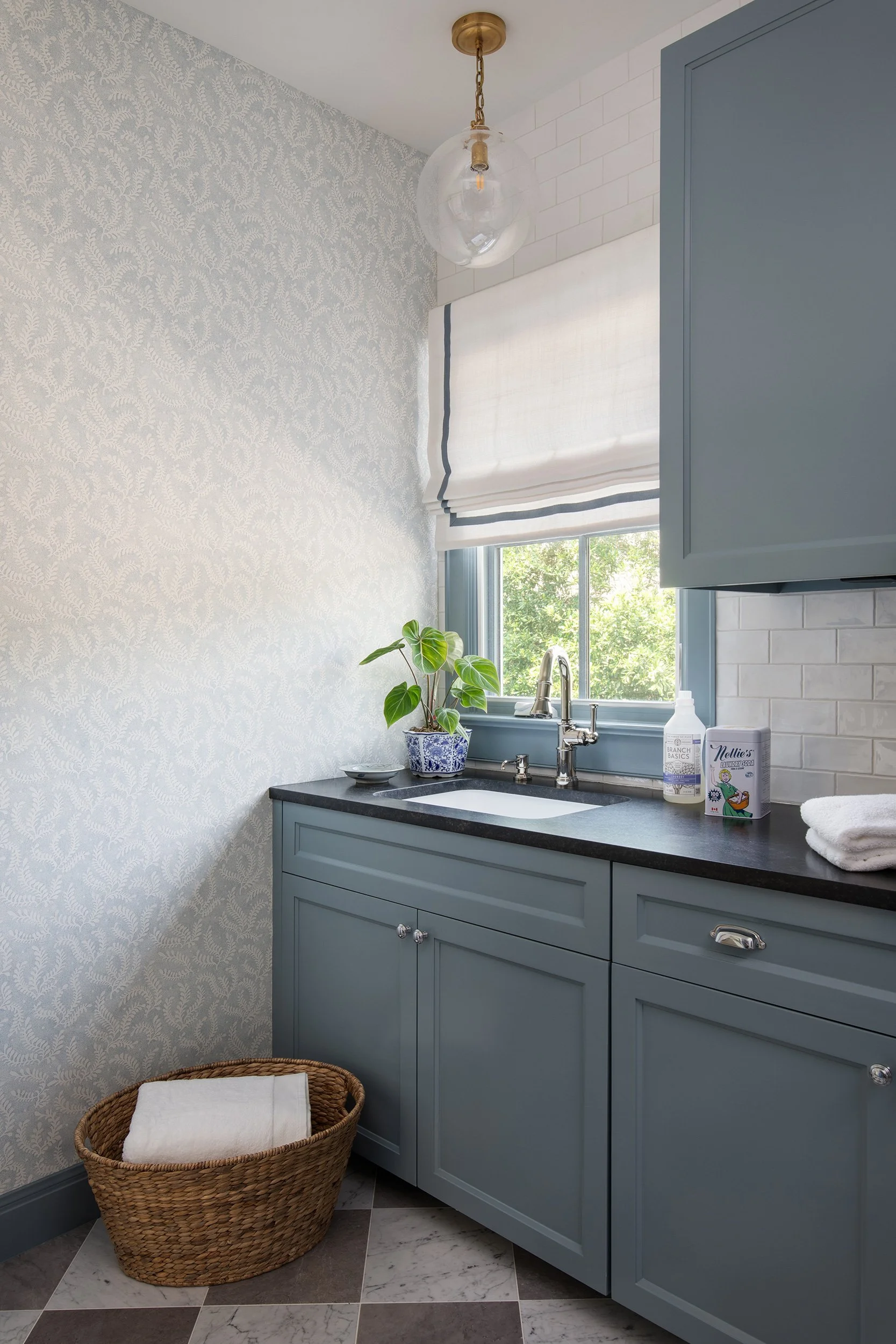 Travis Country Home laundry room design by Heather Scott Home & Design, build by Drake Build and architecture by Architecture by George. Photography by Avery Nicole Photography and located in Austin, Texas