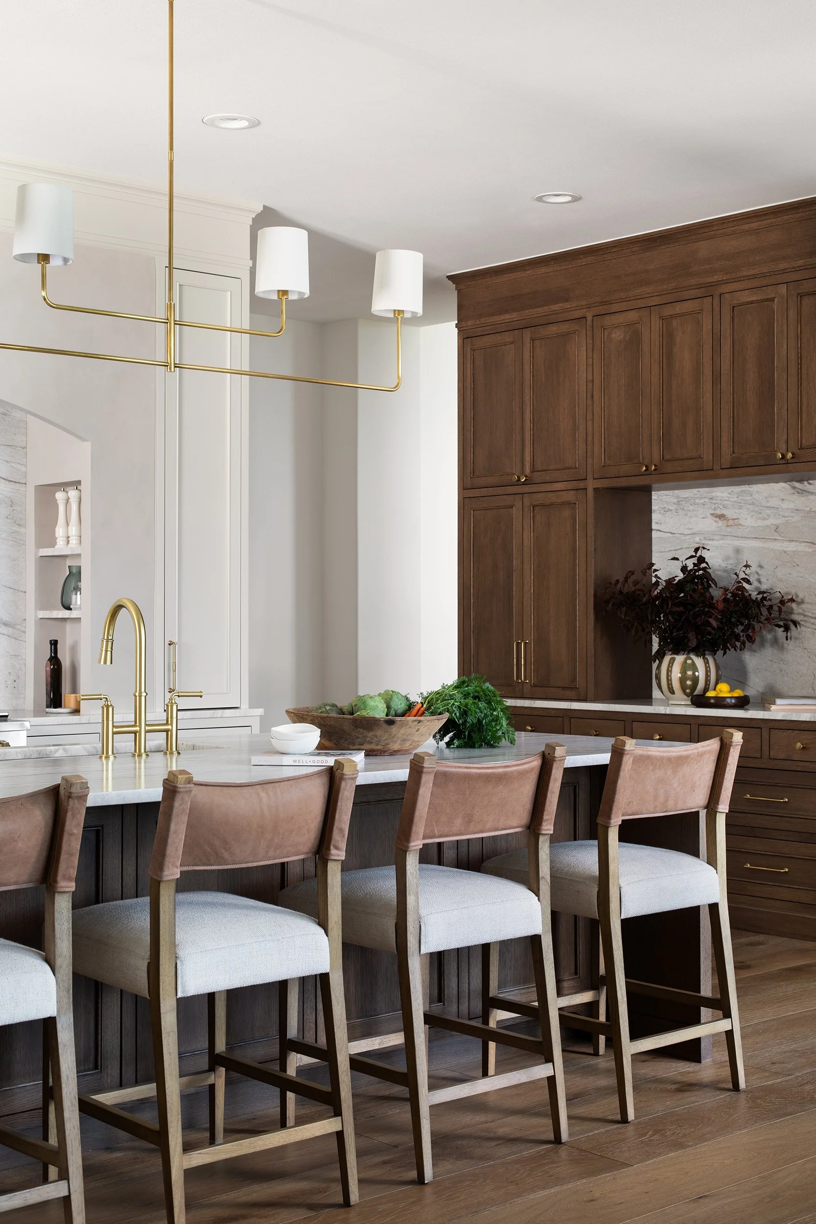 The Falls Residence kitchen design Etch Design Group, residential interior design photography by Avery Nicole Photography and located in Austin, Texas