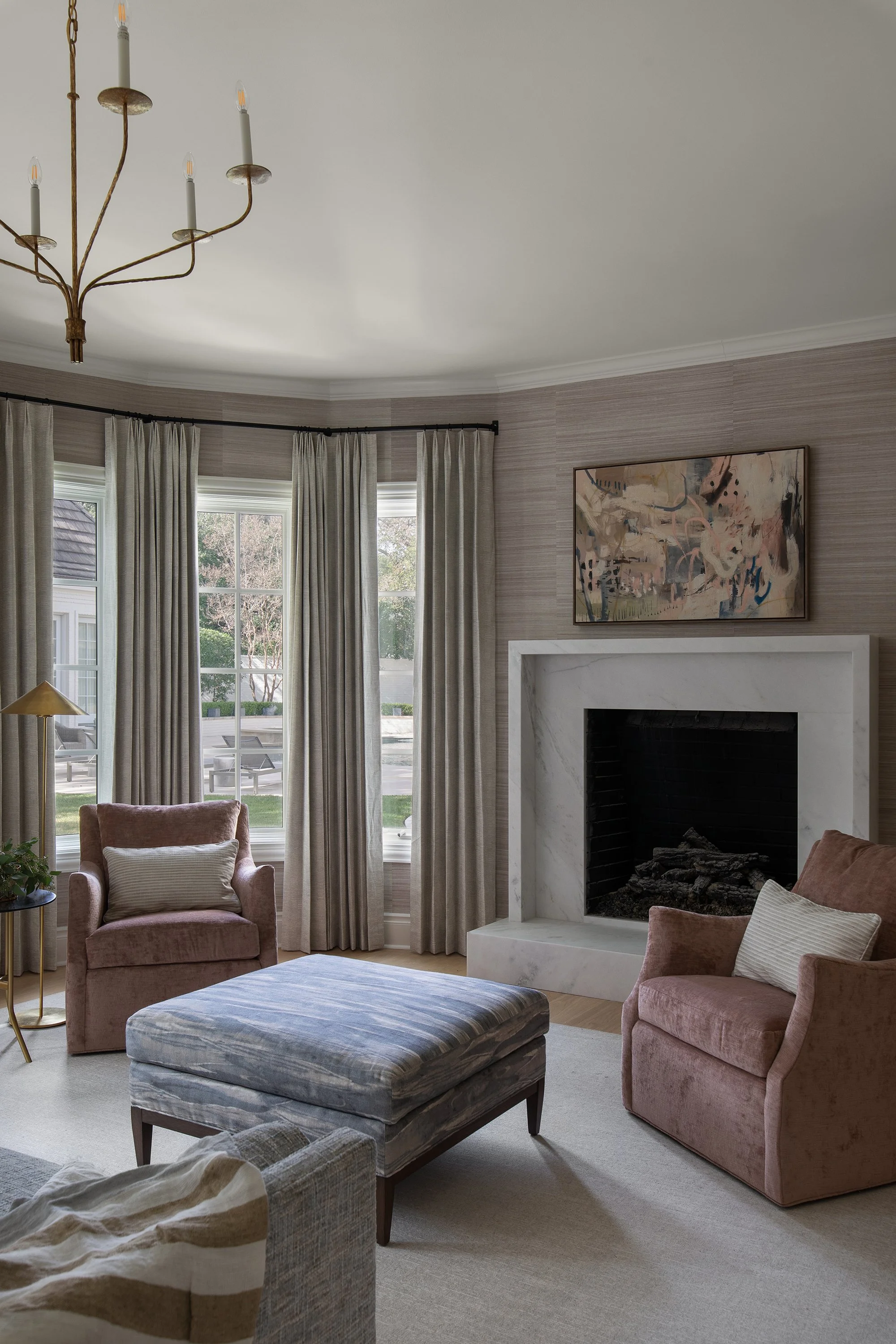 Lake Austin estate primary bedroom fireplace interior design by The Pankonien Group, residential photography by Avery Nicole Photography and located Austin, TX
