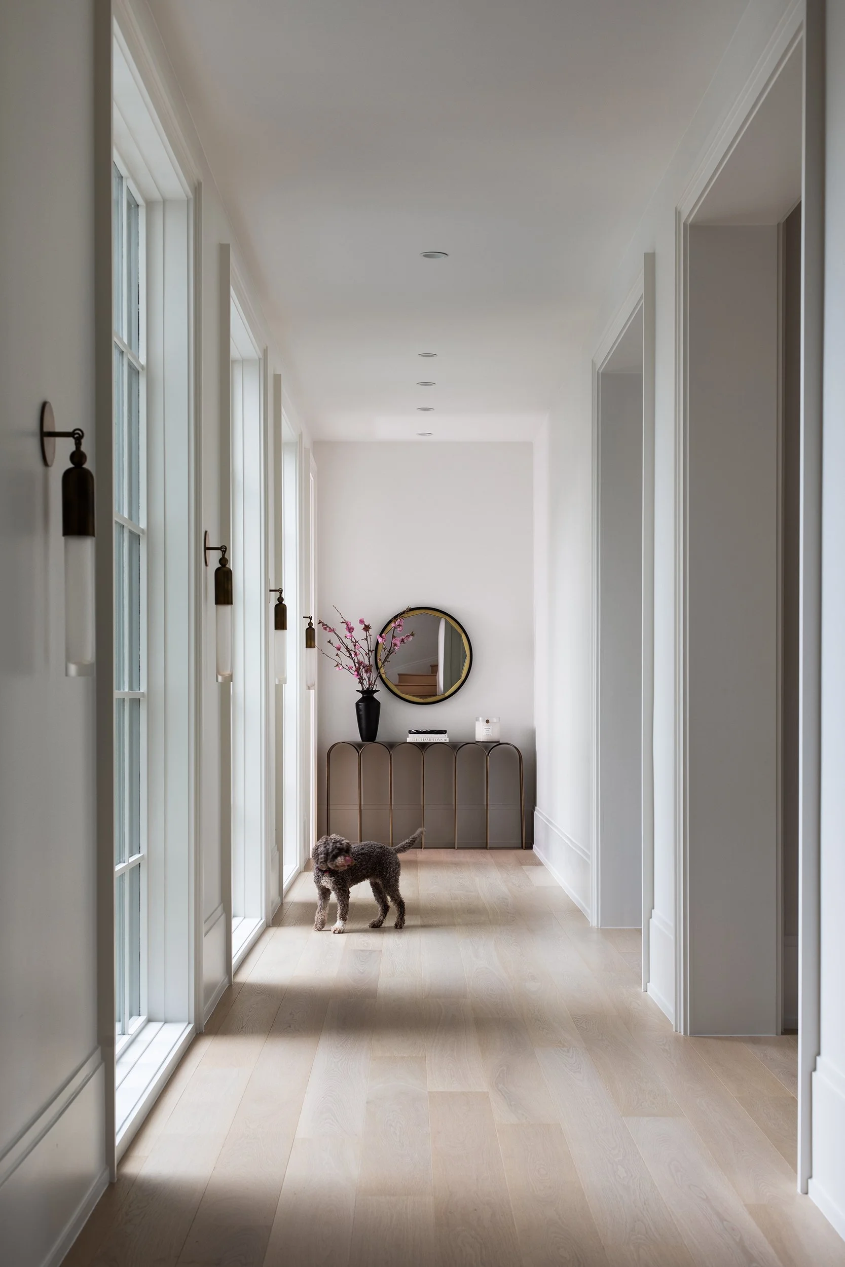 Highland Park home hallway interior design by Emma Corner Interiors, residential photography by Avery Nicole Photography and located in Highland Park in Dallas, Texas