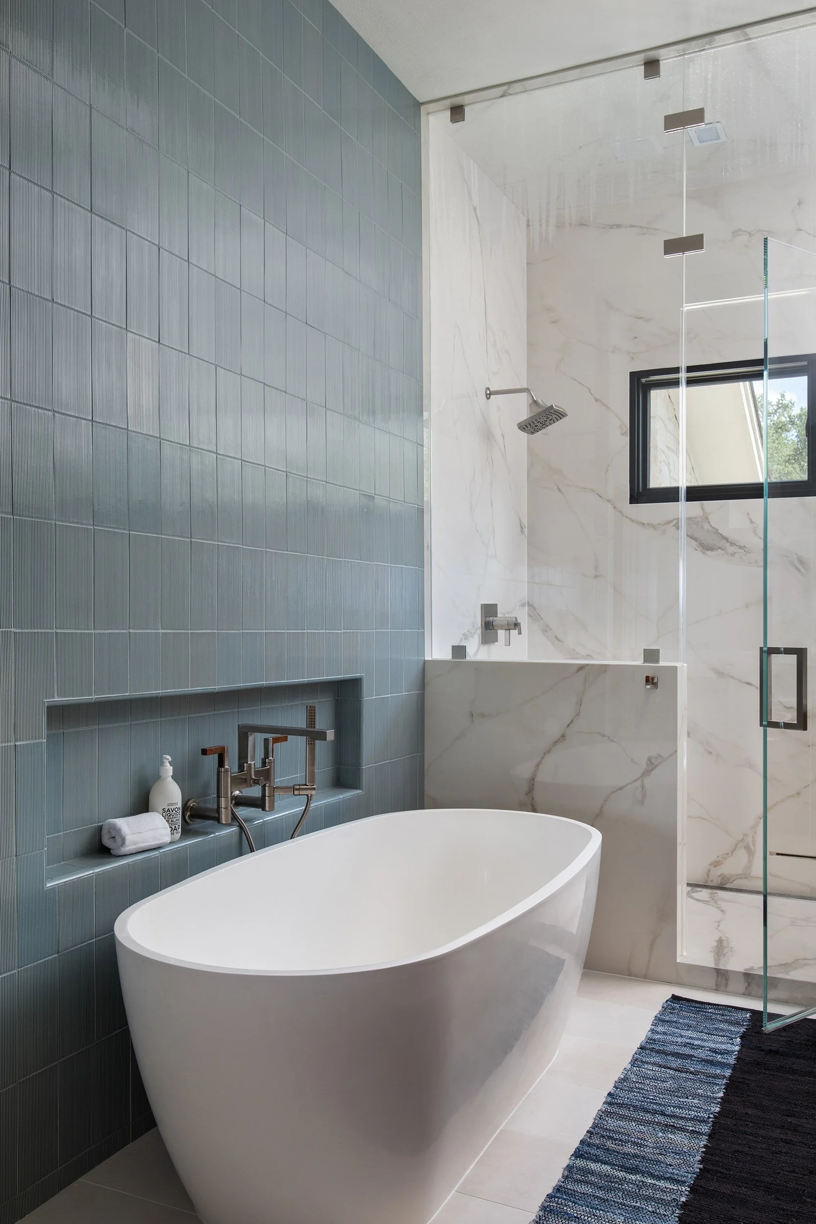 Valburn Remodel primary bathroom design by Urbane Design and construction by Q Construction Solutions. Photography by Avery Nicole Photography and located in Austin, Texas