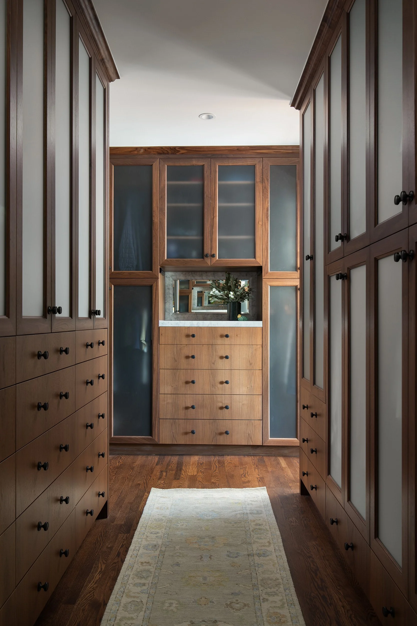Old Enfield Estate closet by Grasso Gay Architects and built by Messer Design + Construction, residential photography by Avery Nicole Photography and located in Old Enfield Neighborhood in Austin, Texas