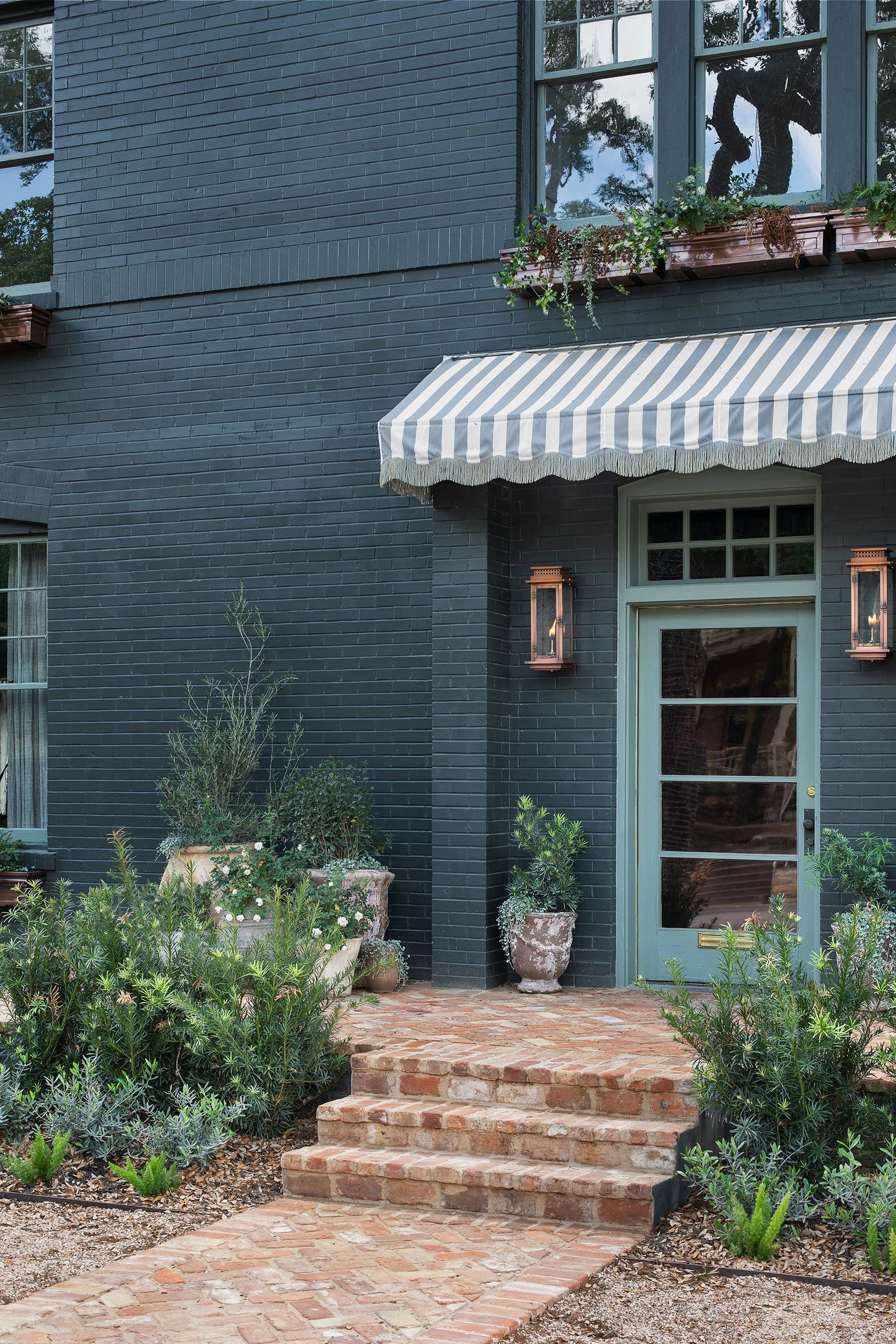 Front exterior vignette from the West House project, designed by Chelsea Kloss with LV Collective, Austin Texas, photography by Avery Nicole Photography