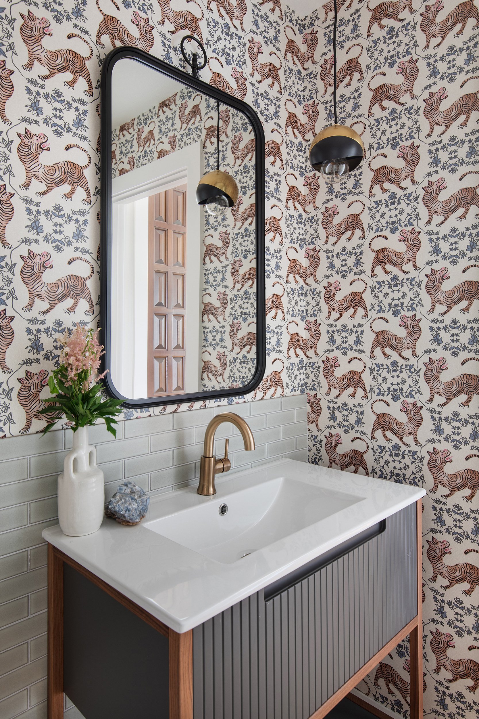 Valburn Remodel powder bathroom design by Urbane Design and construction by Q Construction Solutions. Photography by Avery Nicole Photography and located in Austin, Texas