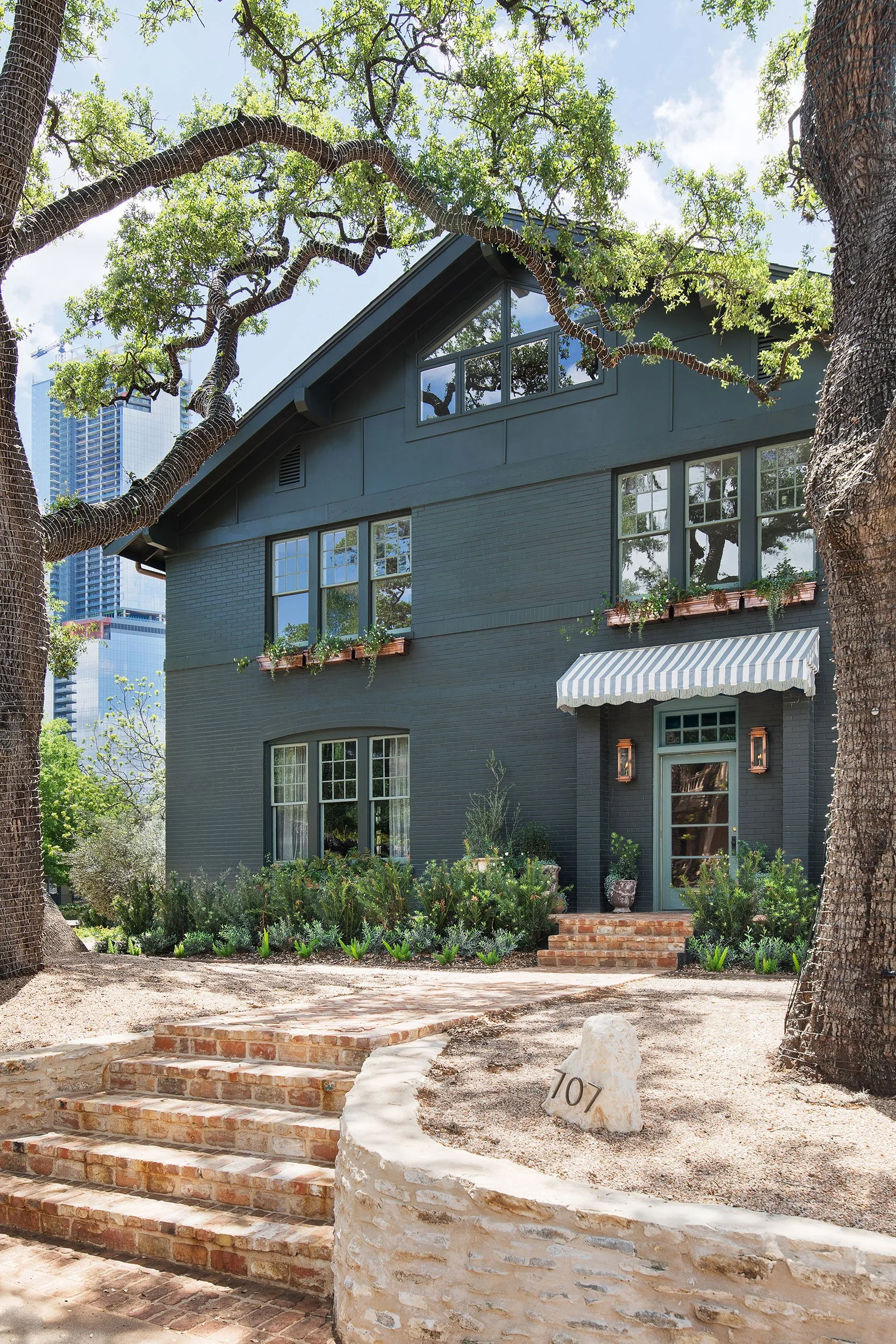Front exterior vignette from the West House project, designed by Chelsea Kloss with LV Collective, Austin Texas, photography by Avery Nicole Photography