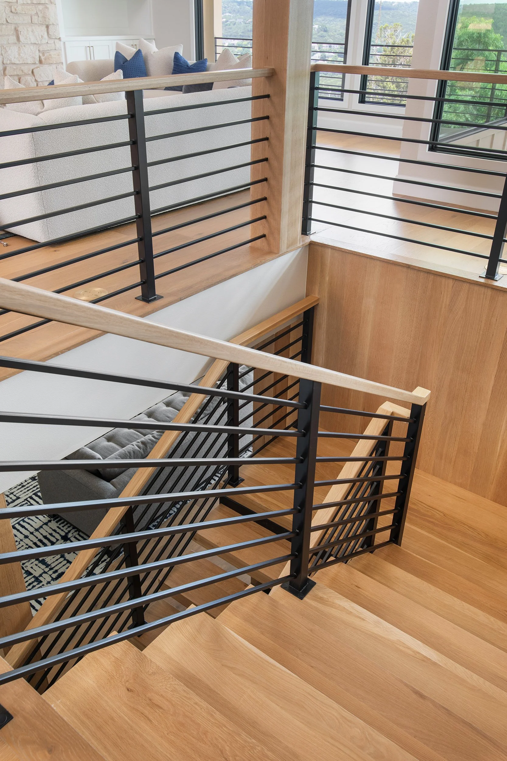 Valburn Remodel stairs design by Urbane Design and construction by Q Construction Solutions. Photography by Avery Nicole Photography and located in Austin, Texas