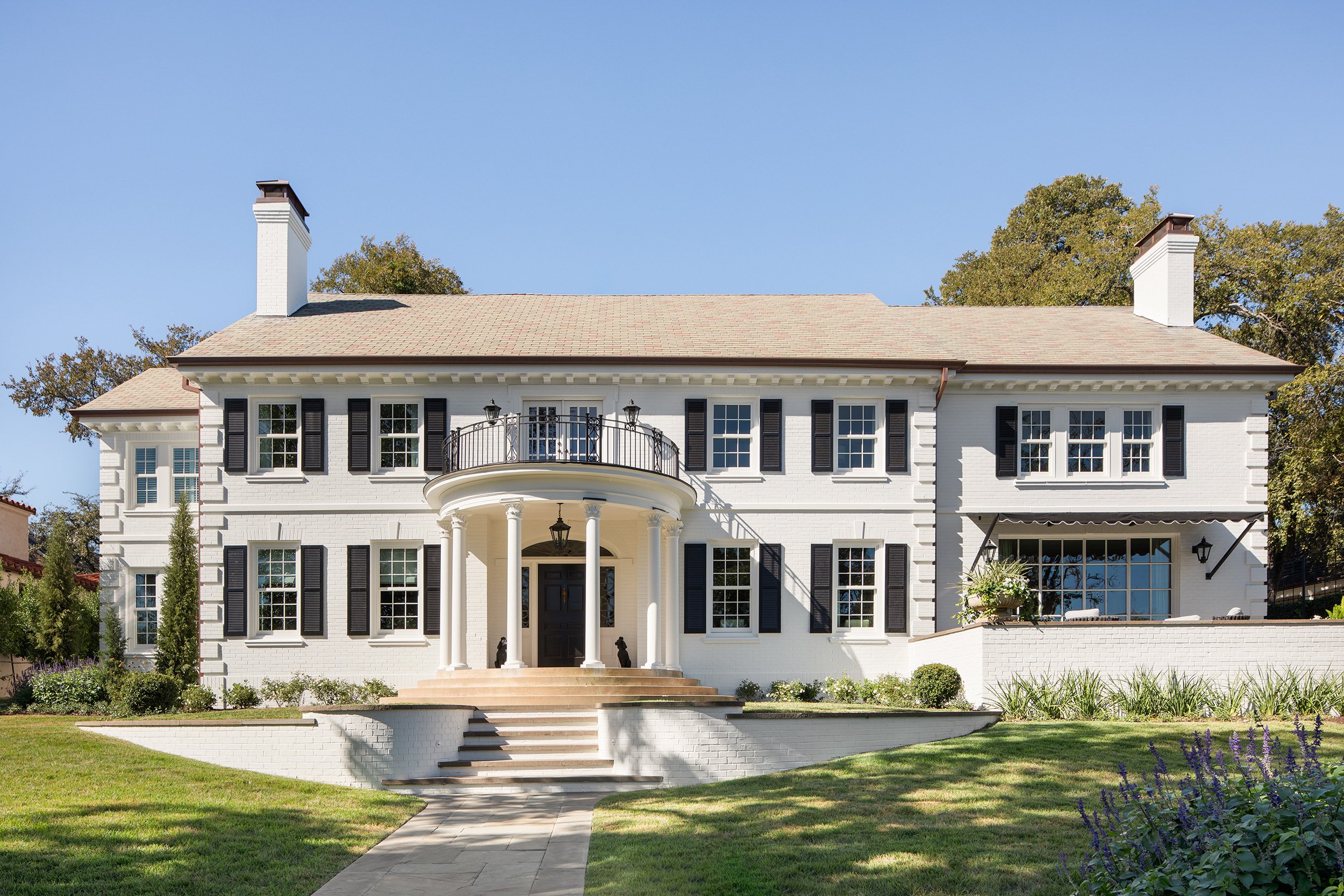 Old Enfield Estate back exterior by Grasso Gay Architects and built by Messer Design + Construction, residential photography by Avery Nicole Photography and located in Old Enfield Neighborhood in Austin, Texas