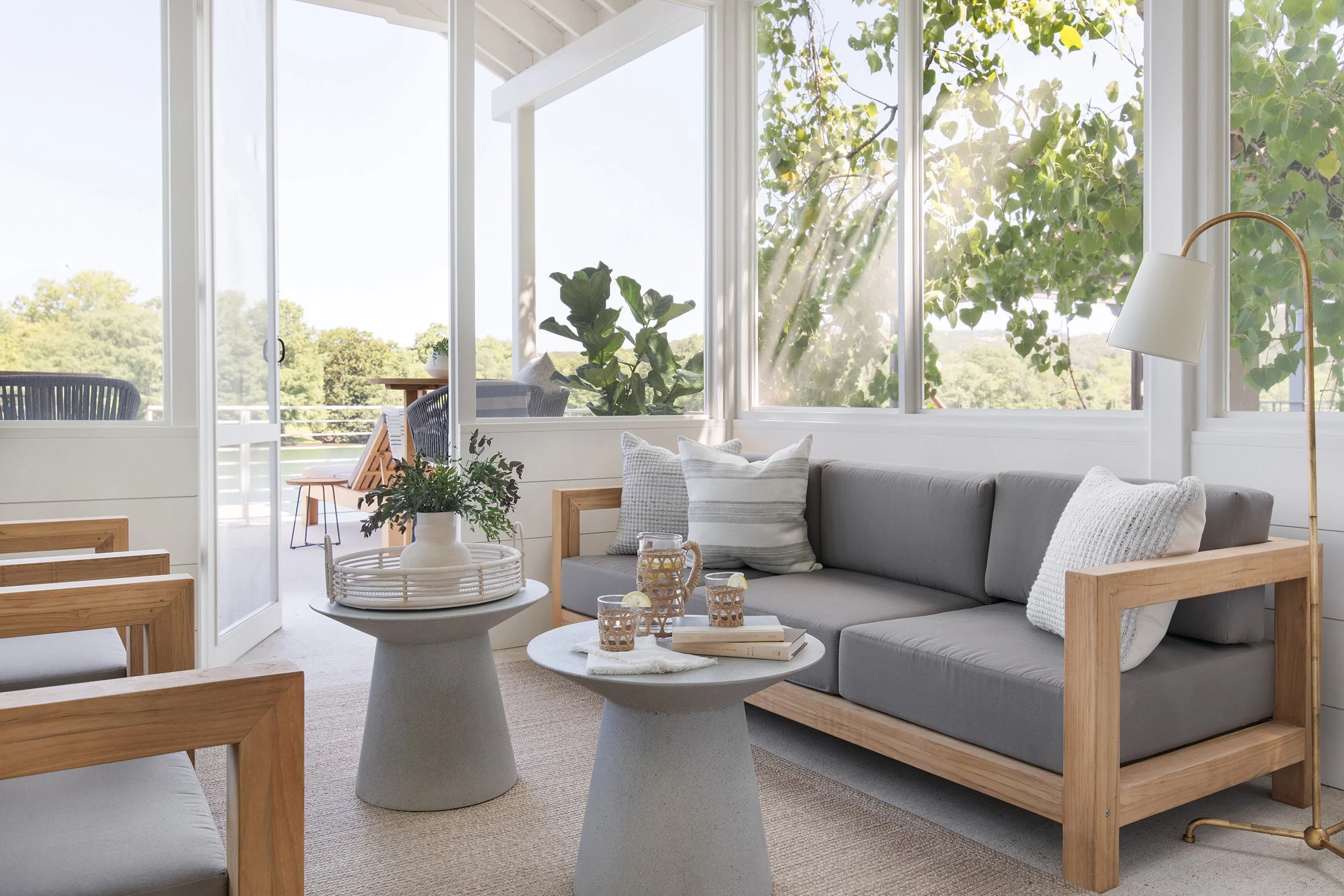 Seating area from The Toad Inn boathouse, designed by The Pankonien Group, Lake Austin, Austin Texas, photography by Avery Nicole Photography