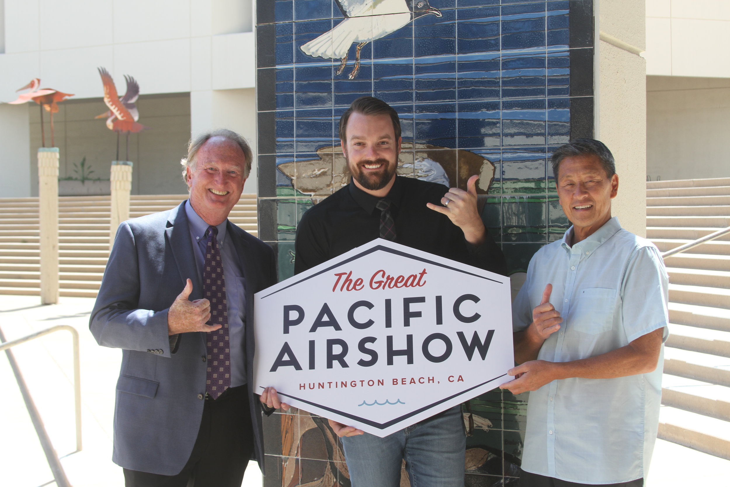 (L-R) Huntington Beach Mayor Mike Posey, Code Four CEO Kevin Elliott, and Huntington Surf & Sport Founder Aaron Pai