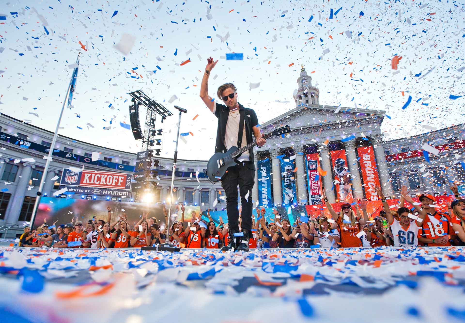 man-playing-guitar-with-confetti-falling.jpg