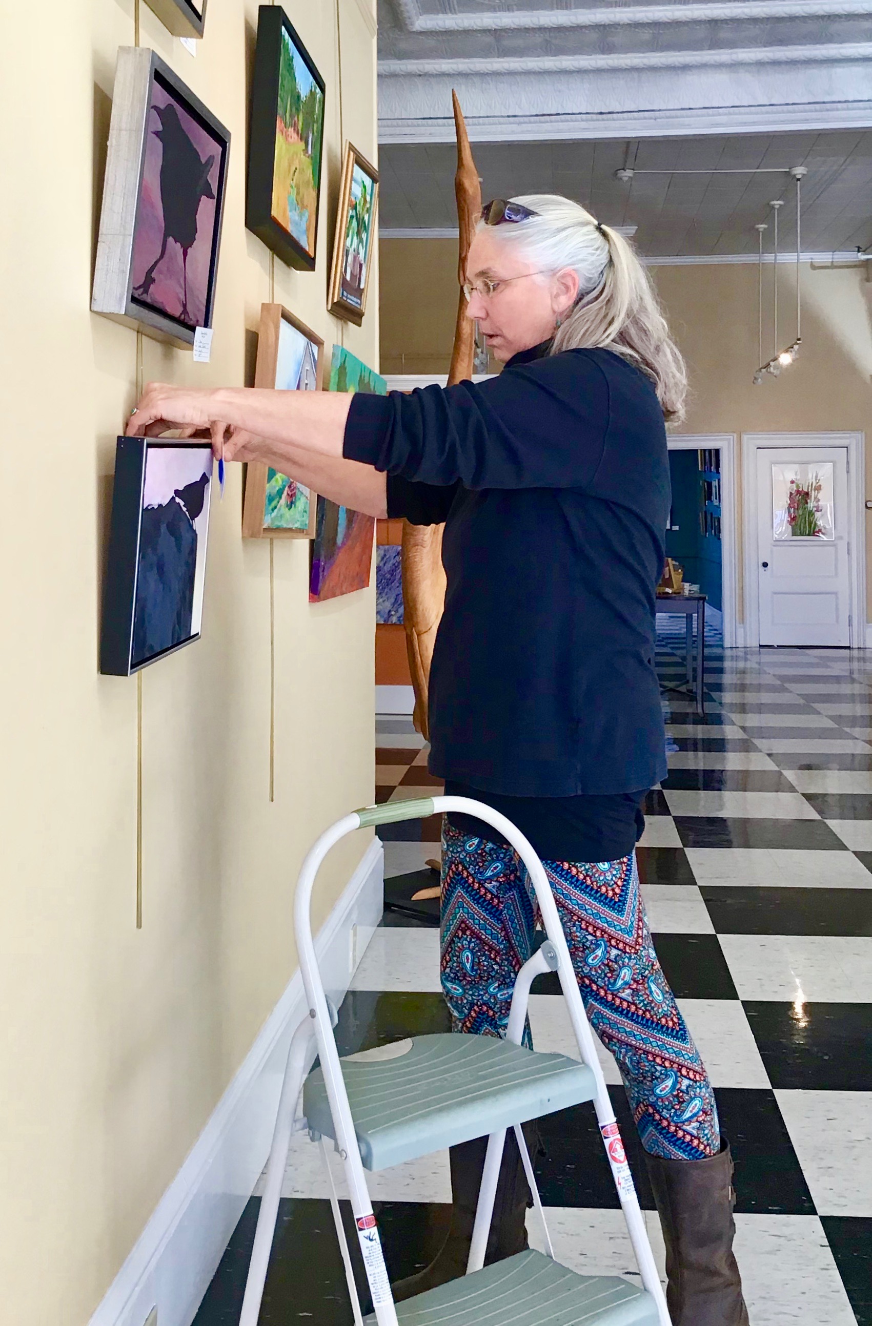 Laurie is hanging her new paintings!