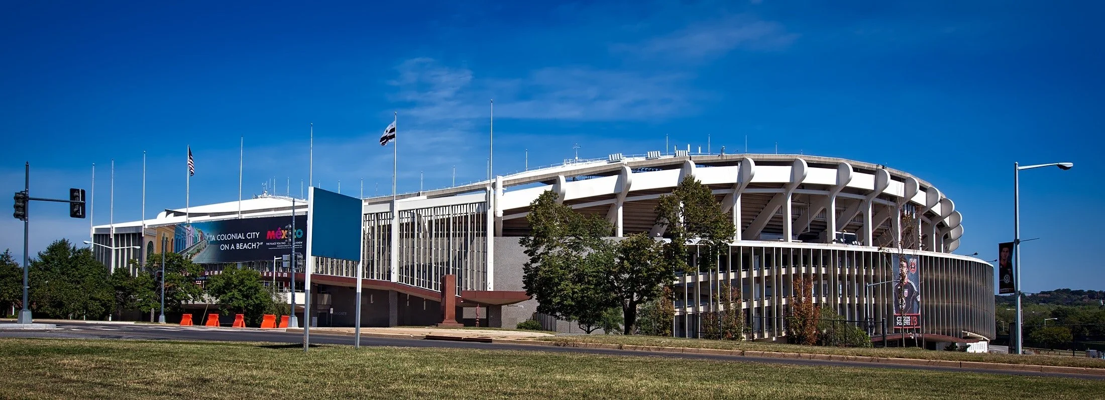 white-concrete-building-on-green-grass-field-during-daytime-209918.jpg