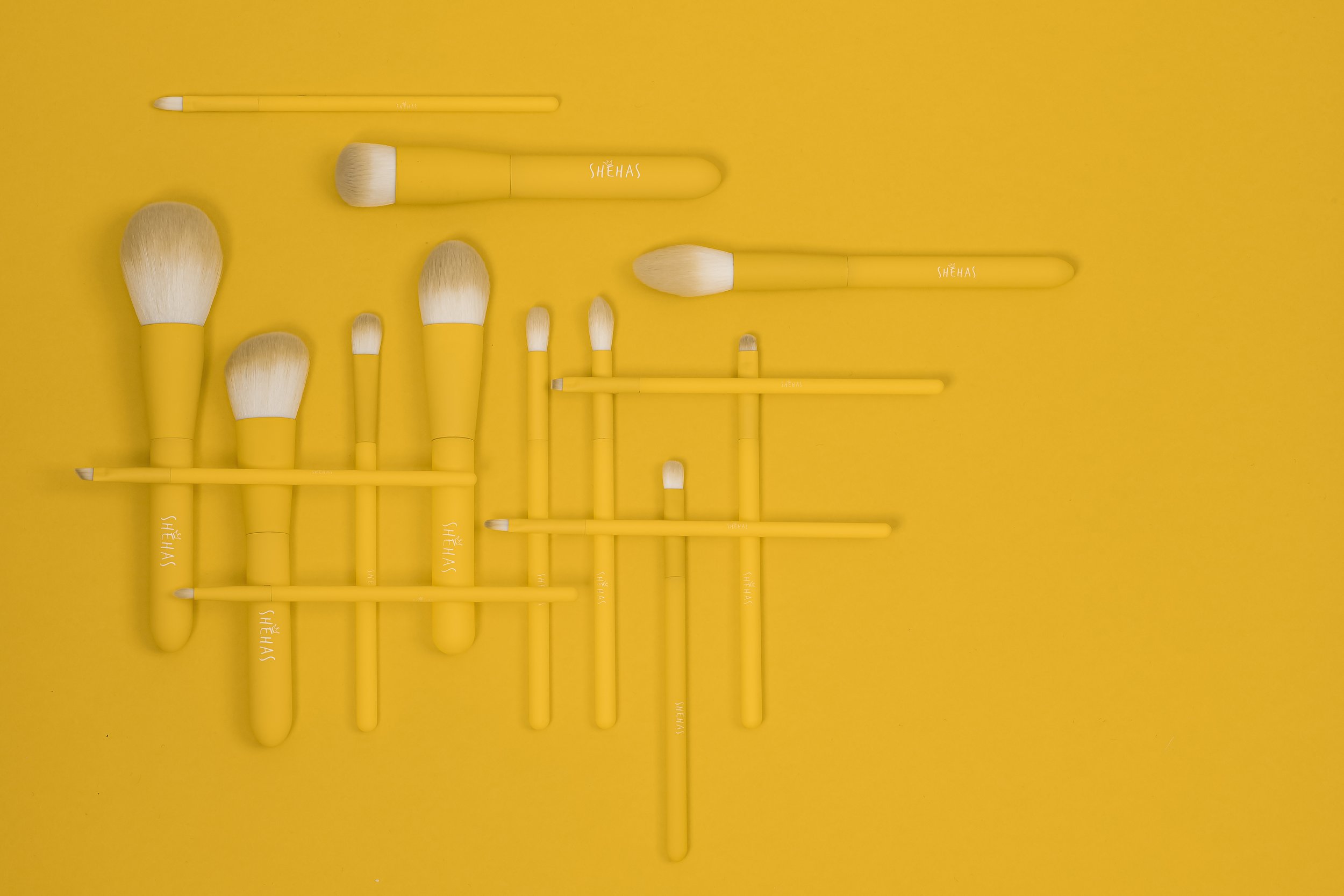 SheHas Yellow Makeup Brushes - product photography by Andrew Werner .jpg