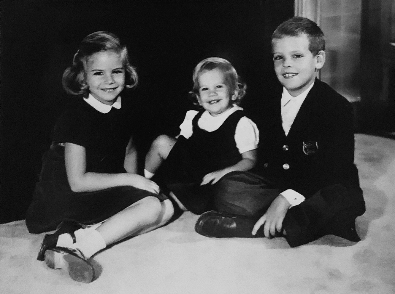  Rocky, age six, seated to the right of sisters Gail and Karey. 