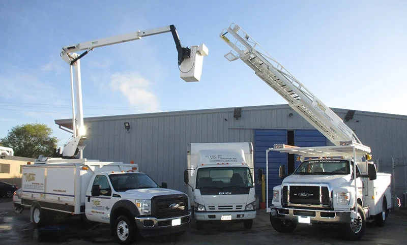 web-pic-34-vehicles-raised-buck-truck-ladder-truck-with-box-van.jpg