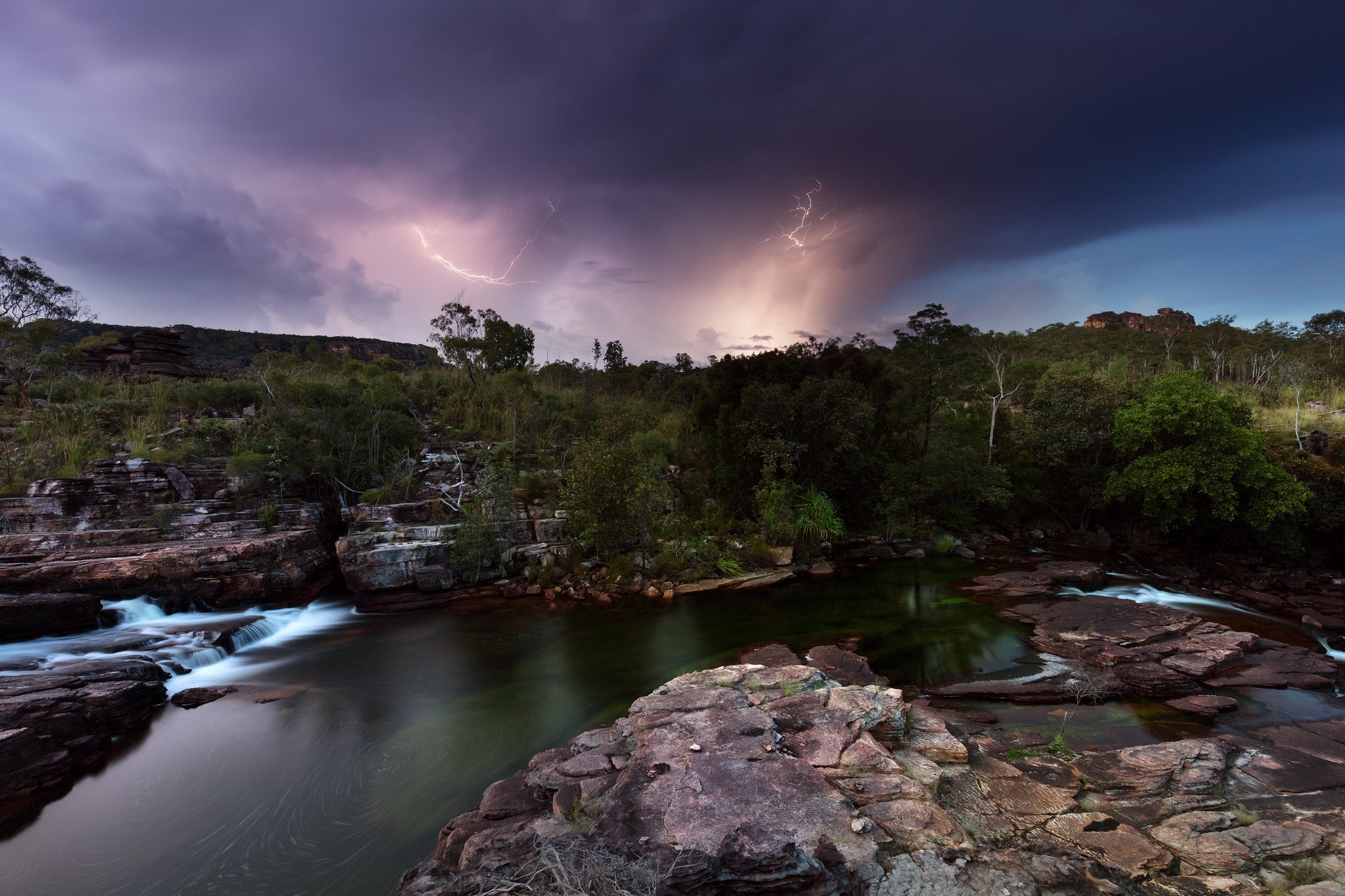 Cascades Beneath a Restless Sky