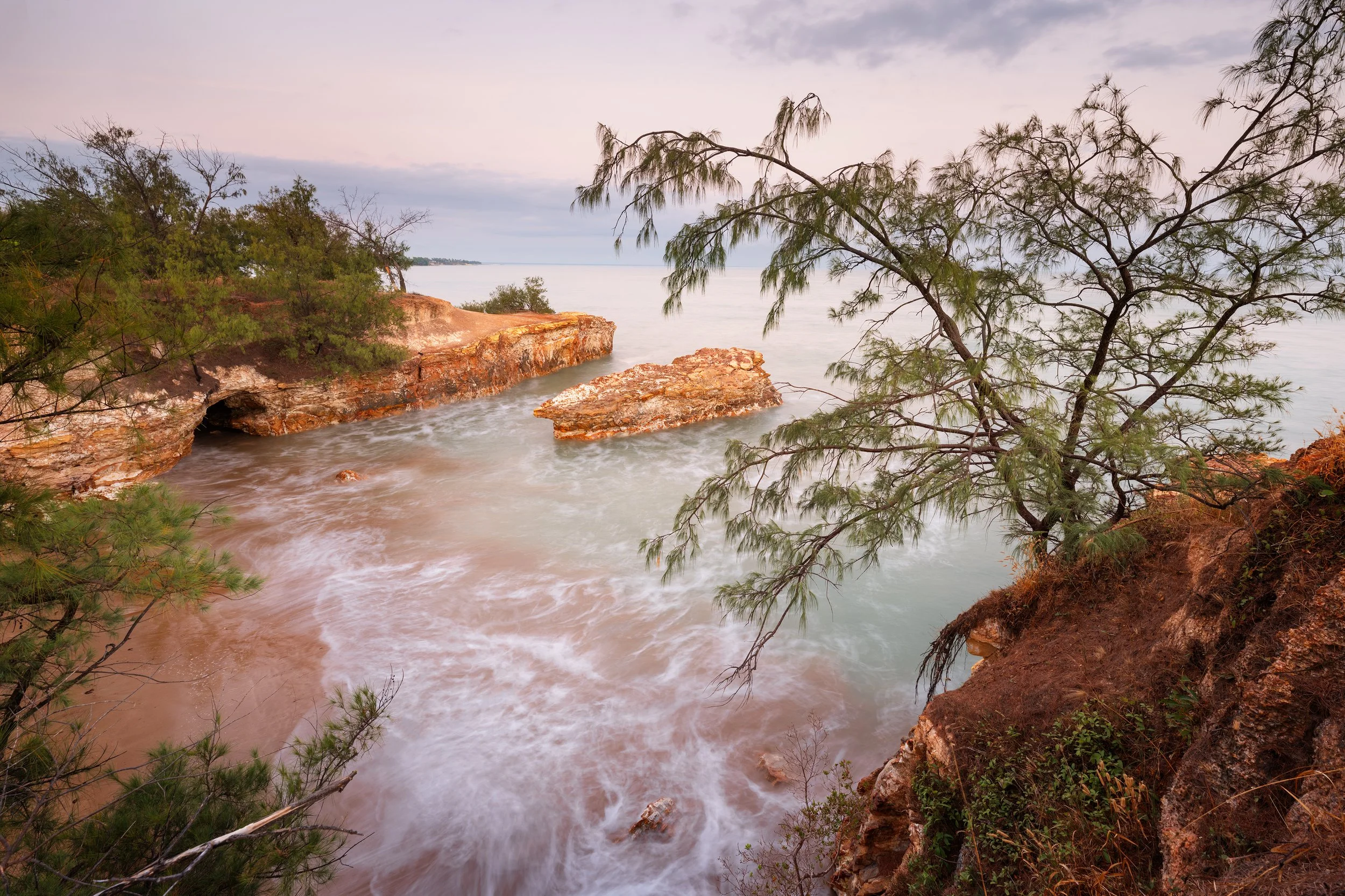Dripstone Cliffs - Where high tide greets the cove