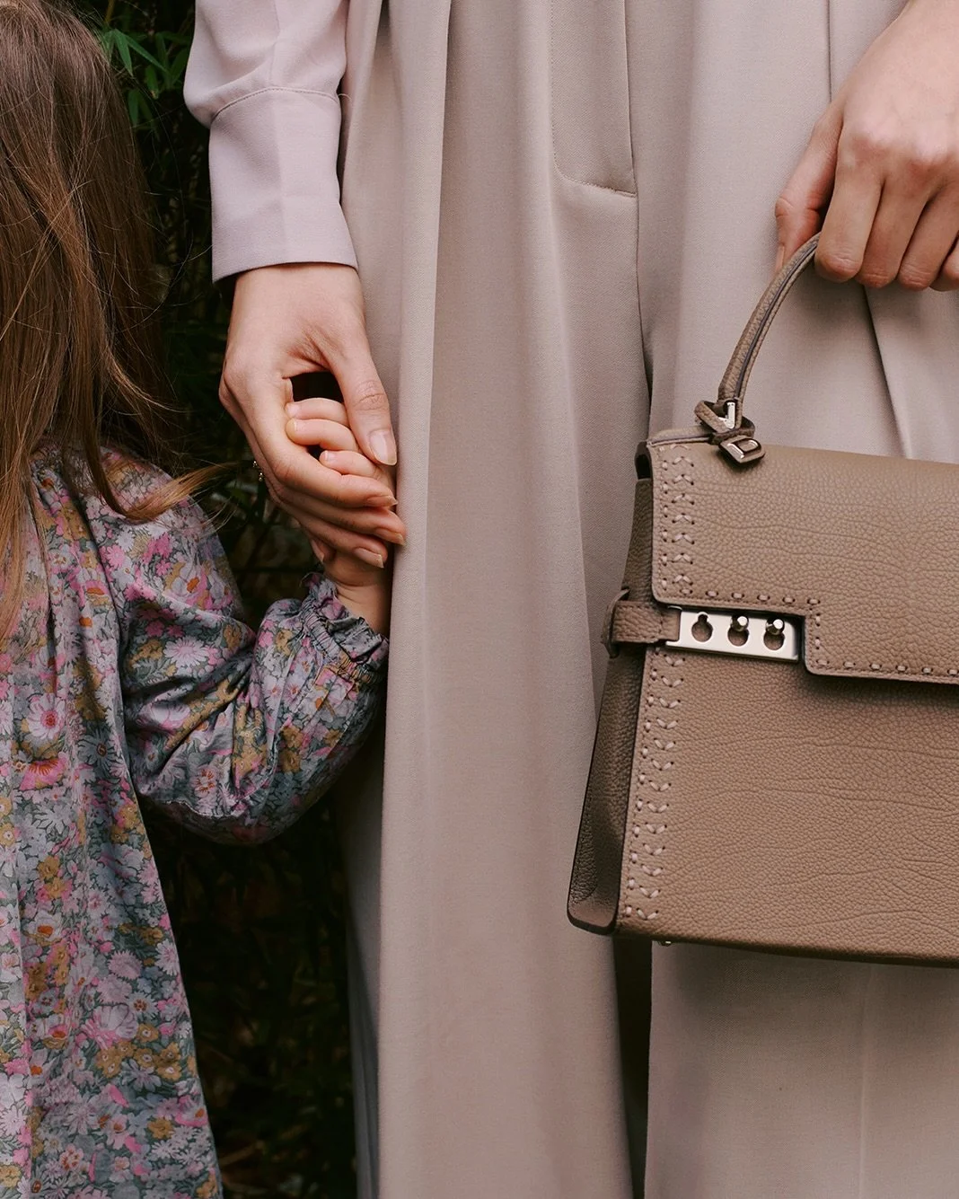 A mother carries us through life with ease, care and an effortless sense of grace. In those same arms, in her hands, and close to her heart, sometimes her children&rsquo;s hands, sometimes her Delvaux. For Mother&rsquo;s Day, Delvaux celebrates the m
