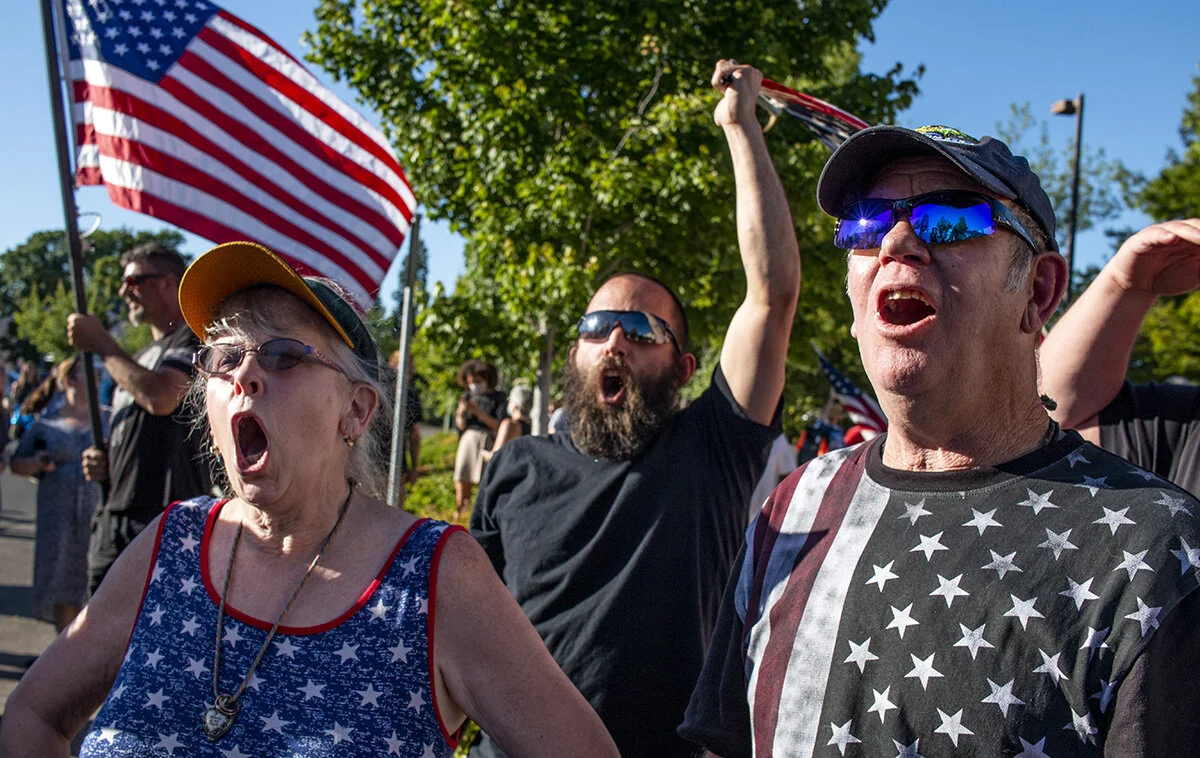  Pro-police rally attendees shout "all lives matter" in response to counter protestors shouting "Black lives matter." A pro-police rally was held in Springfield, Oregon, Monday afternoon, June 22. The event, organized by Springfield resident Joe Frit