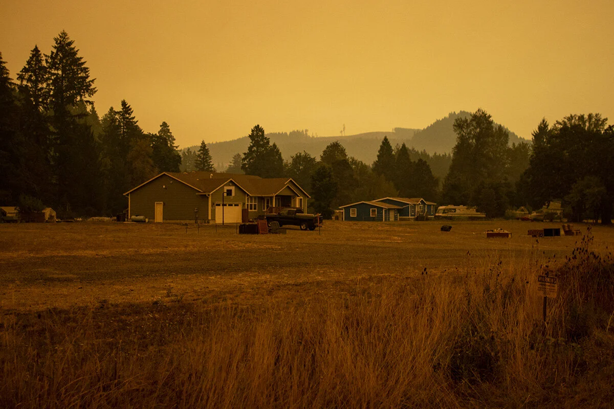  Orange haze from ash and smoke envelops a home in Marcola, Oregon, after residents of the area were forced to evacuate from the Holiday Farm fire. 