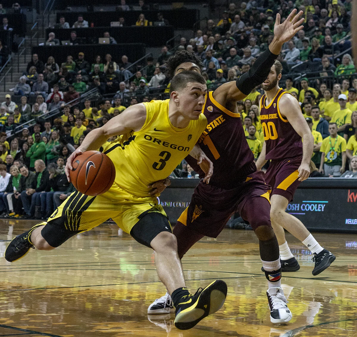  University of Oregon Ducks Payton Pritchard (#3) charges his way past Arizona State Sun Devils Remy Martin (#1). The University of Oregon Ducks men’s basketball team defeated the Arizona State Sun Devils 78 – 69 in Matthew Knight Arena Saturday. Duc