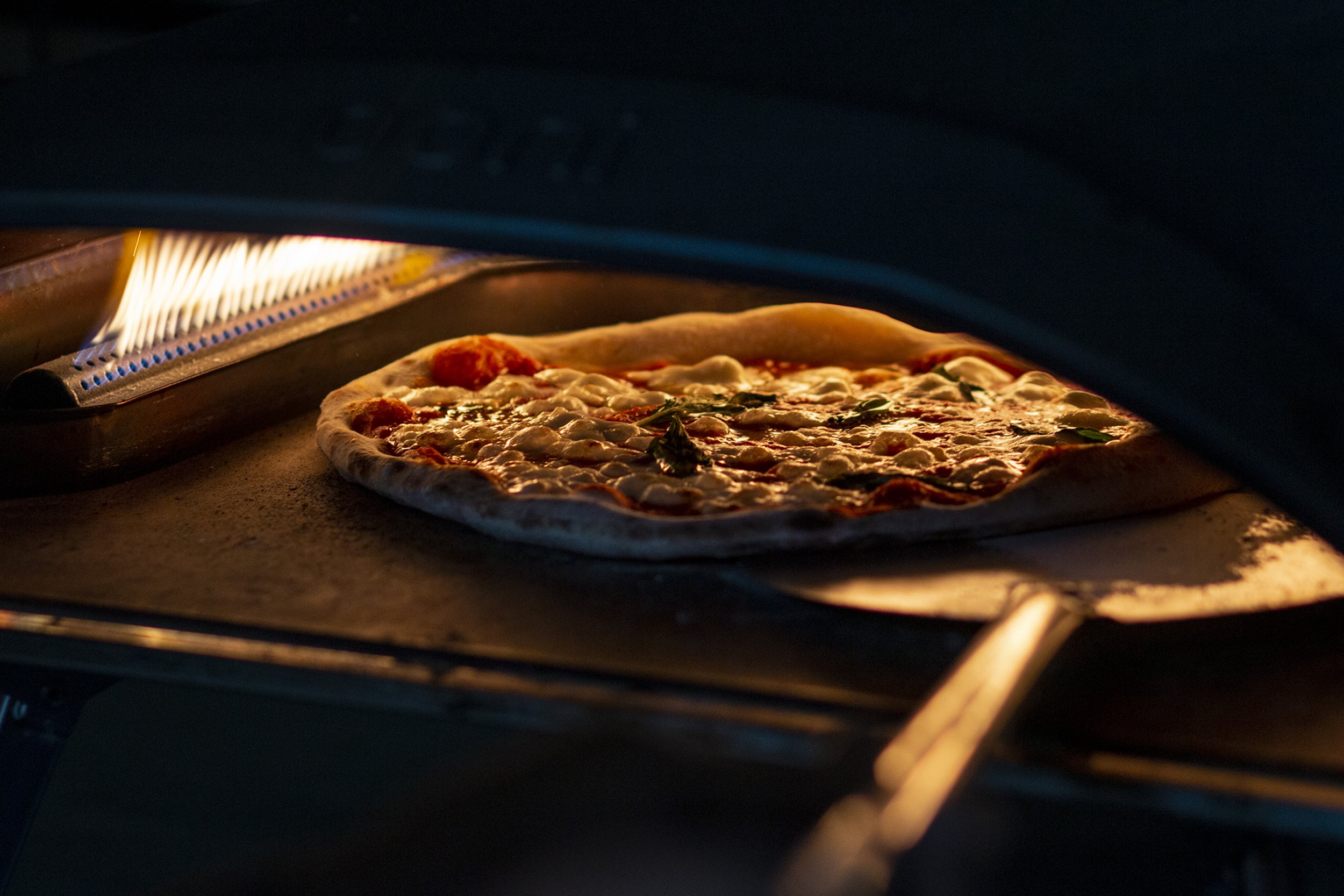  A pizza baking in the gas-powered oven at Beyt Garden Café. Algelany said the pizzas are distinctly Lebanese rather than Italian with all the ingredients used being local and made in Lebanon. She said the ingredients are always fresh and this is par