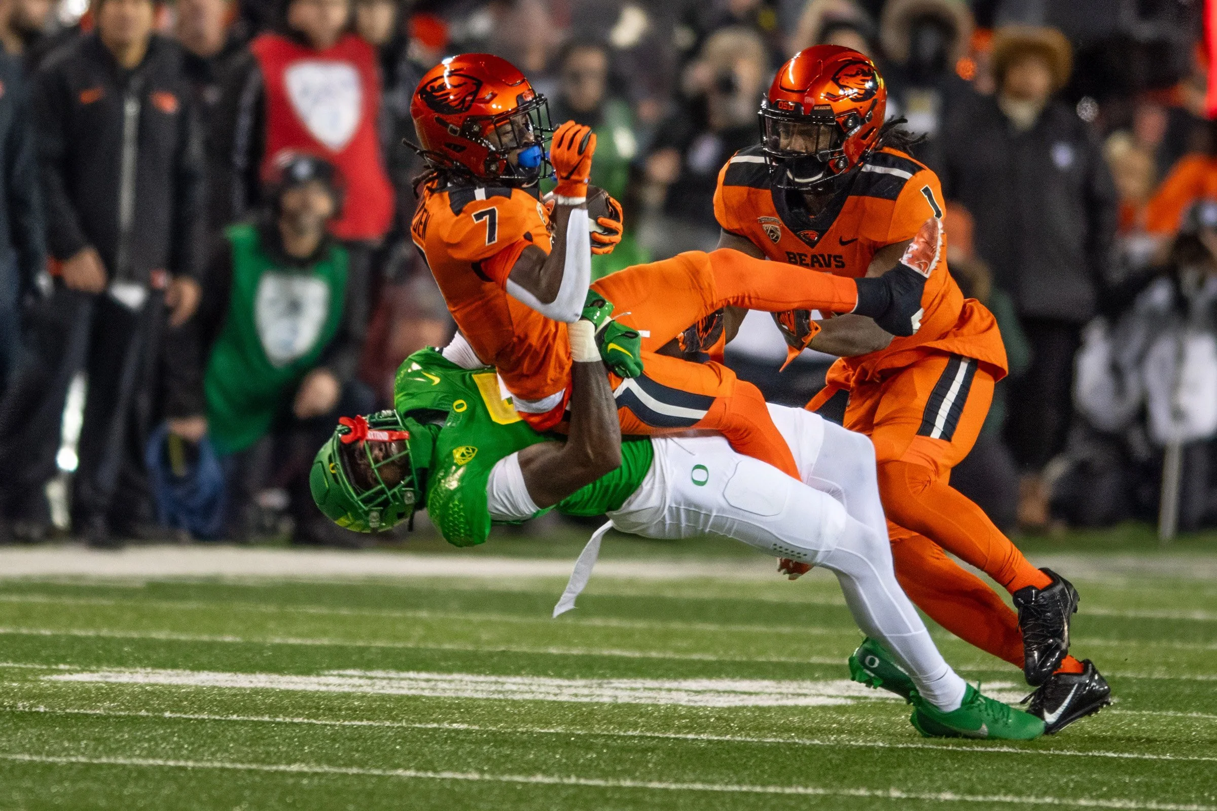  Ducks defensive back Dontae Manning (#8) throwing Beavers wide receiver Silas Bolden (#7) to the ground. The University of Oregon Ducks defeated the Oregon State University Beavers 31-7 in what could be a historic end to the teams’ rivalry as the Du