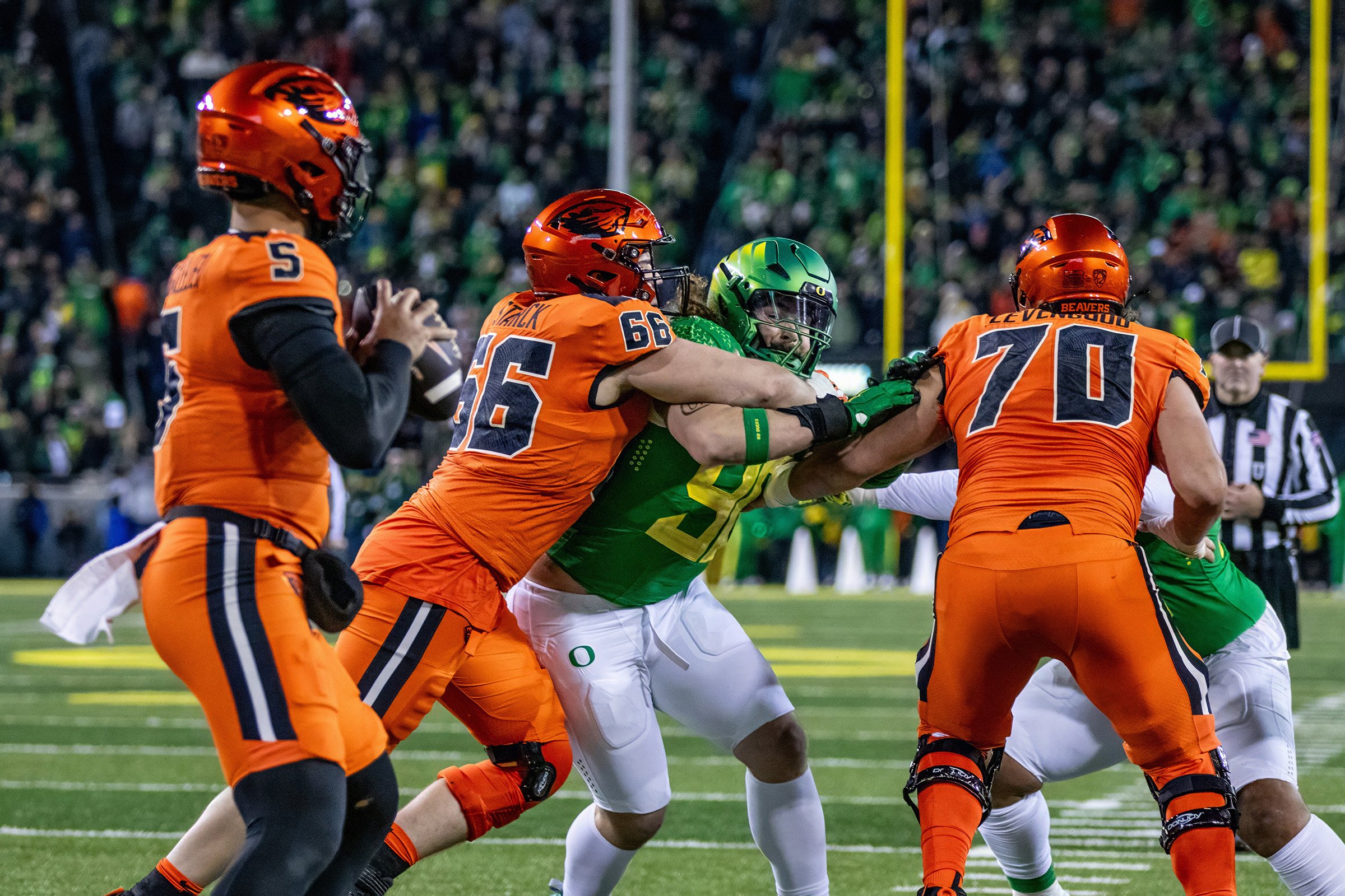  Ducks defensive lineman Casey Rogers (#98) trying to force his way to Beavers quarter back DJ Uiagalelei (#5). The University of Oregon Ducks defeated the Oregon State University Beavers 31-7 in what could be a historic end to the teams’ rivalry as 