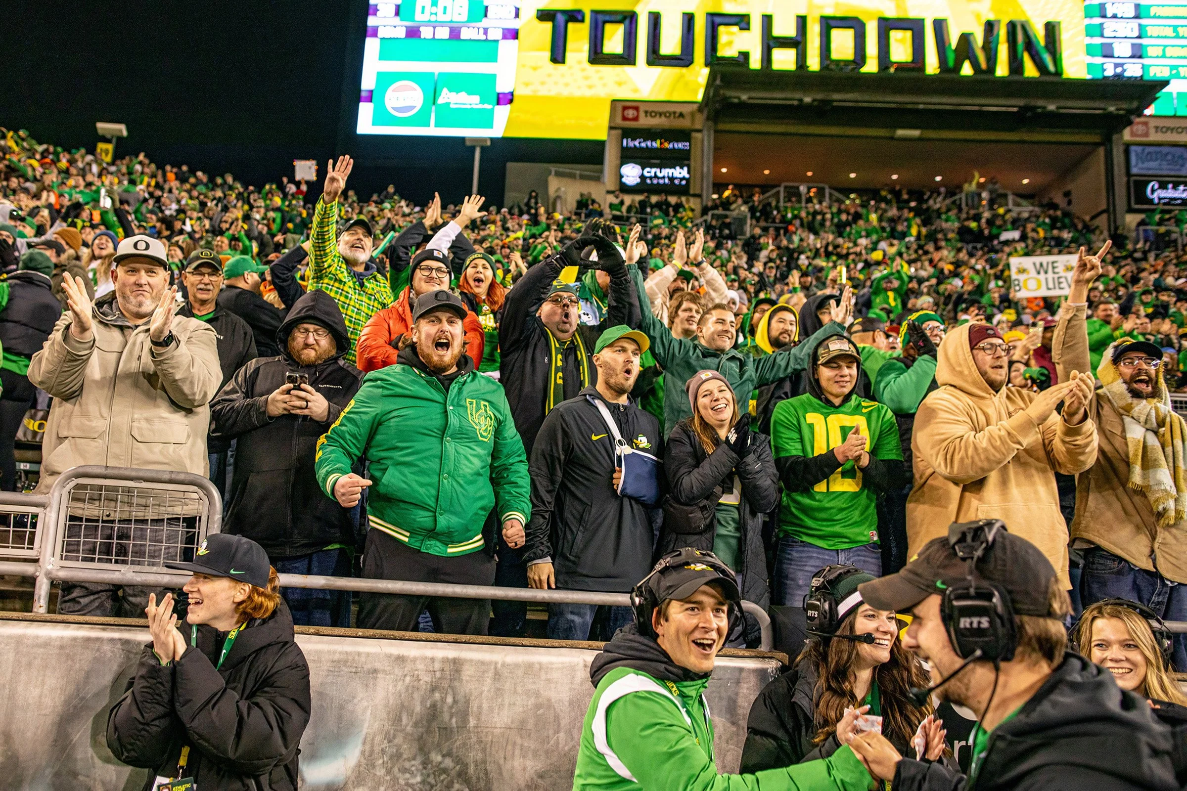  Fans cheering after a touchdown. The University of Oregon Ducks defeated the Oregon State University Beavers 31-7 in what could be a historic end to the teams’ rivalry as the Ducks leave the Pac-12 to join the Big Ten conference. Ducks quarterback B