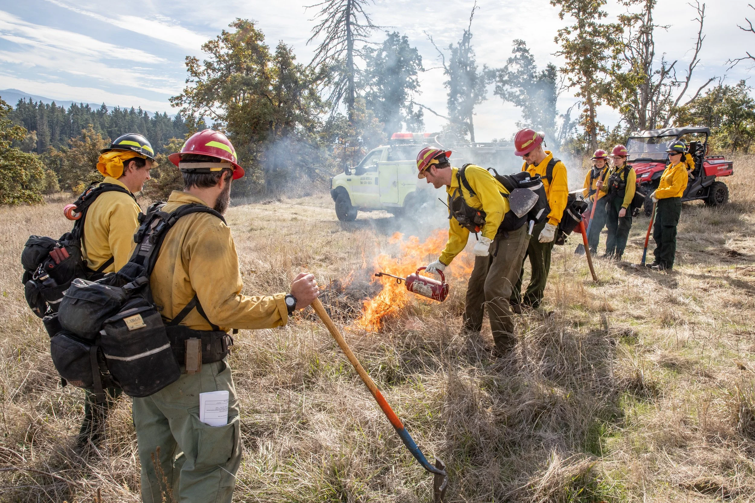  Wildland firefighters assisting with a prescribed burn at the Howard Buford Recreation Area at the base of Mount Pisgah light a test fire to see how the fire behaves before lighting the entirety of the 7.5 acre burn unit. 