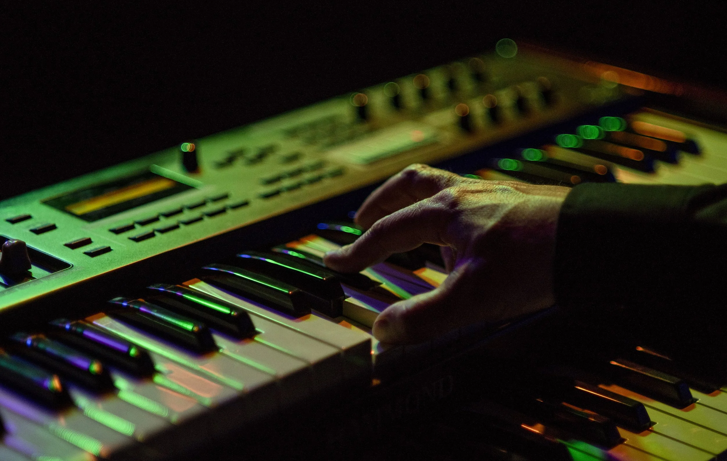  Local musician Brian Swislow plays the keyboard with his band during a concert at Whirled Pies in Eugene, Oregon. 