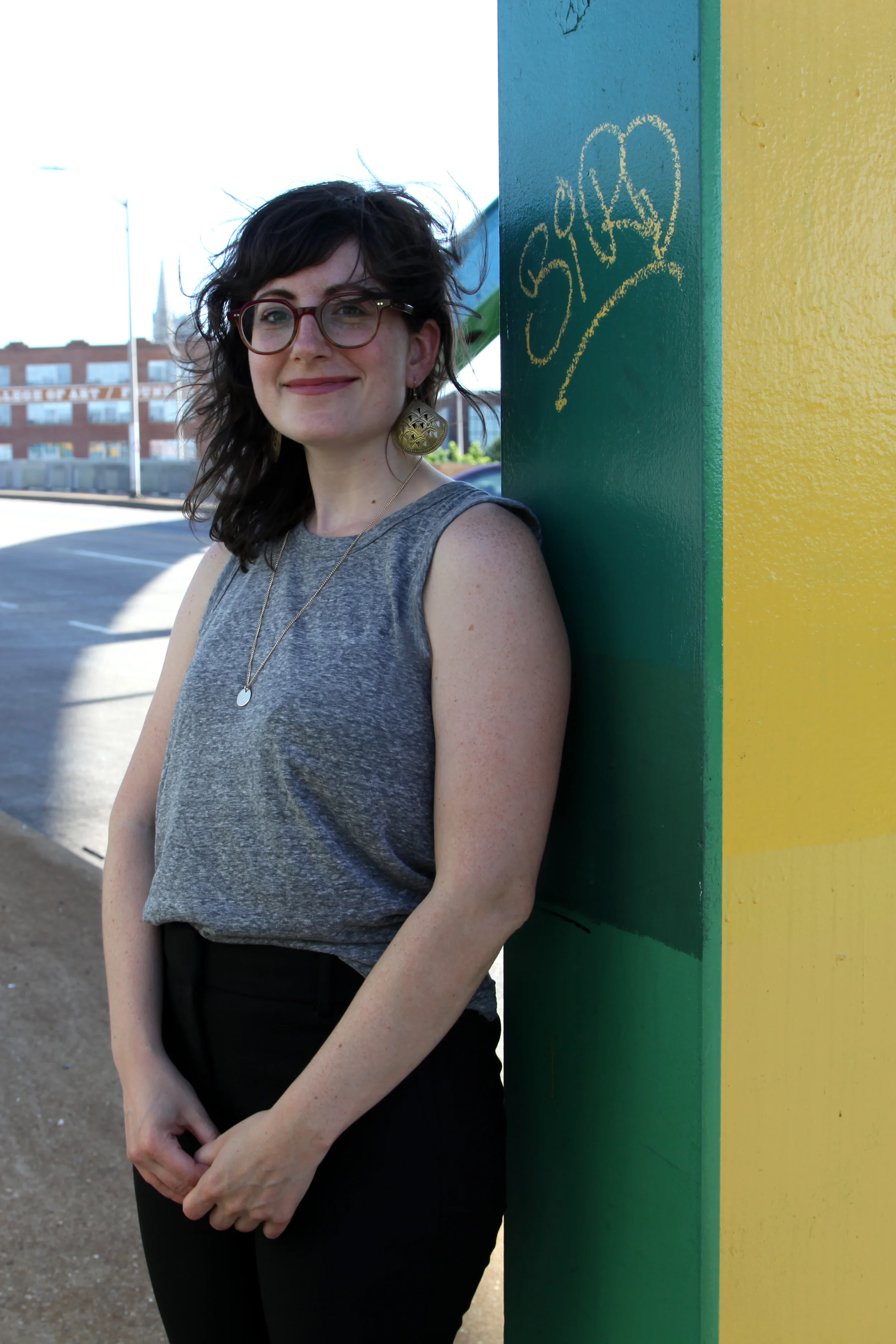 Emily's photo was taken on the Howard Street Bridge aka "the rainbow bridge". Walking over it everyday was part of her commute for grad school, and she always found the color palette cheerful. She enjoys knowing that a former mayor once wanted to paint the bridge a single color (kelly green), but a public poll revealed that residents desired to keep it as it was. People's choice!