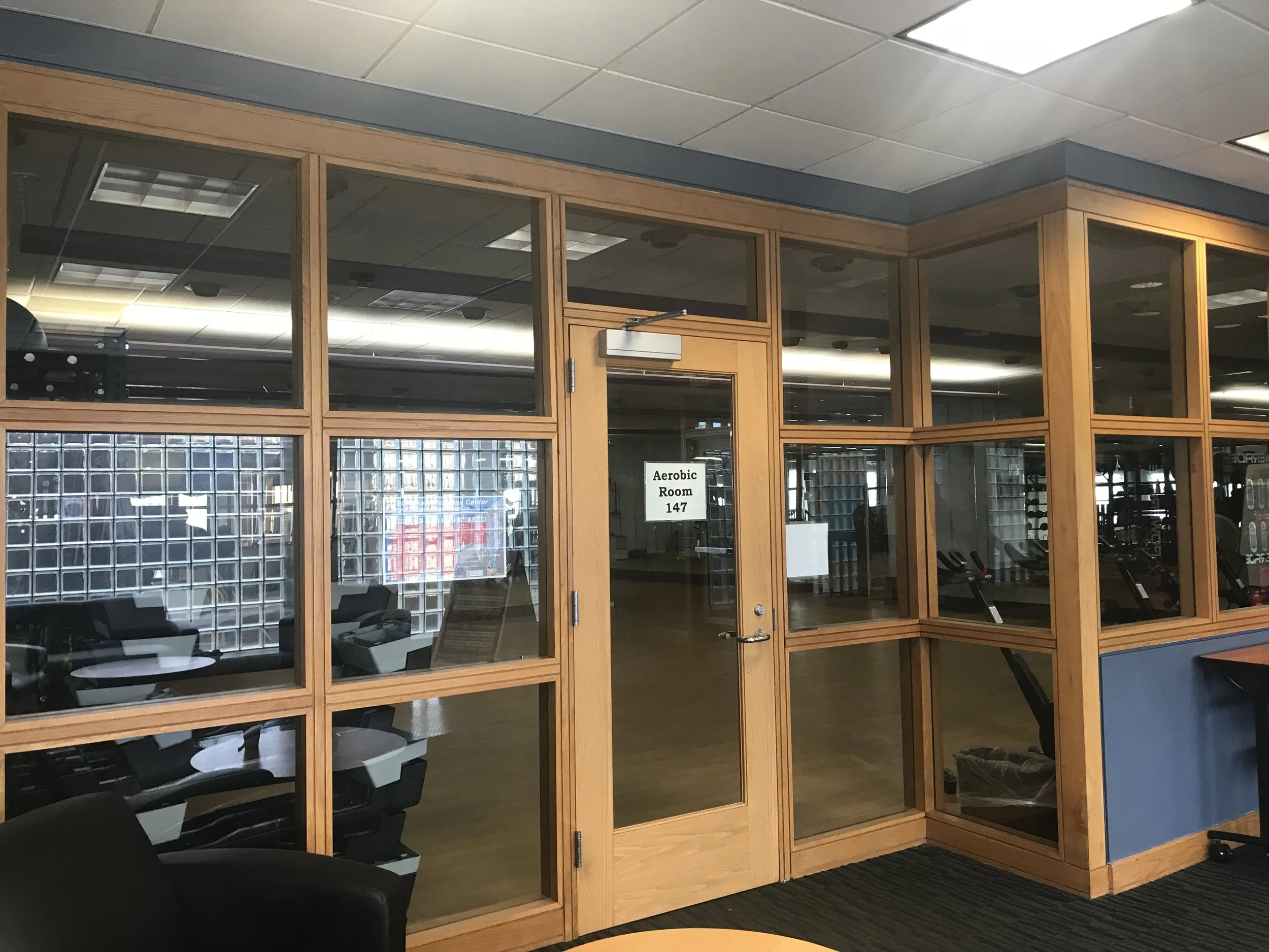 Room 147, also known as the aerobics room, is where yoga classes are held.
