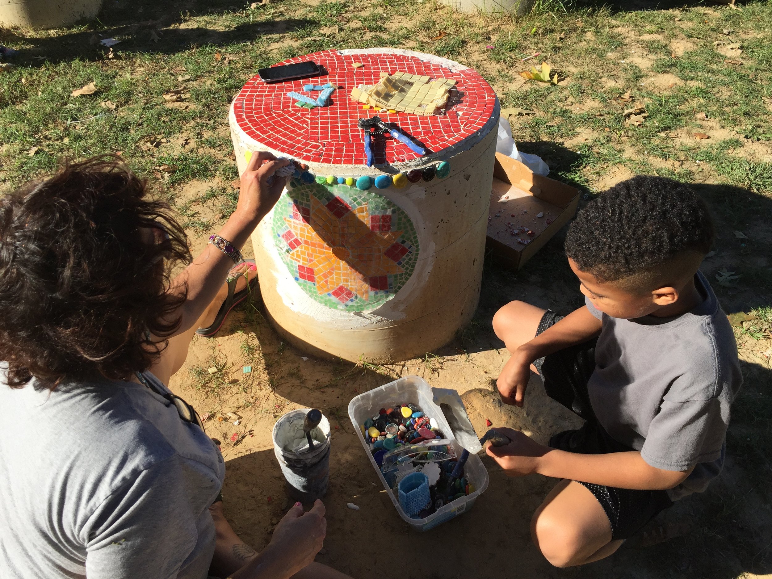 working-on-a-stool-in-the-mosaic-garden.jpg