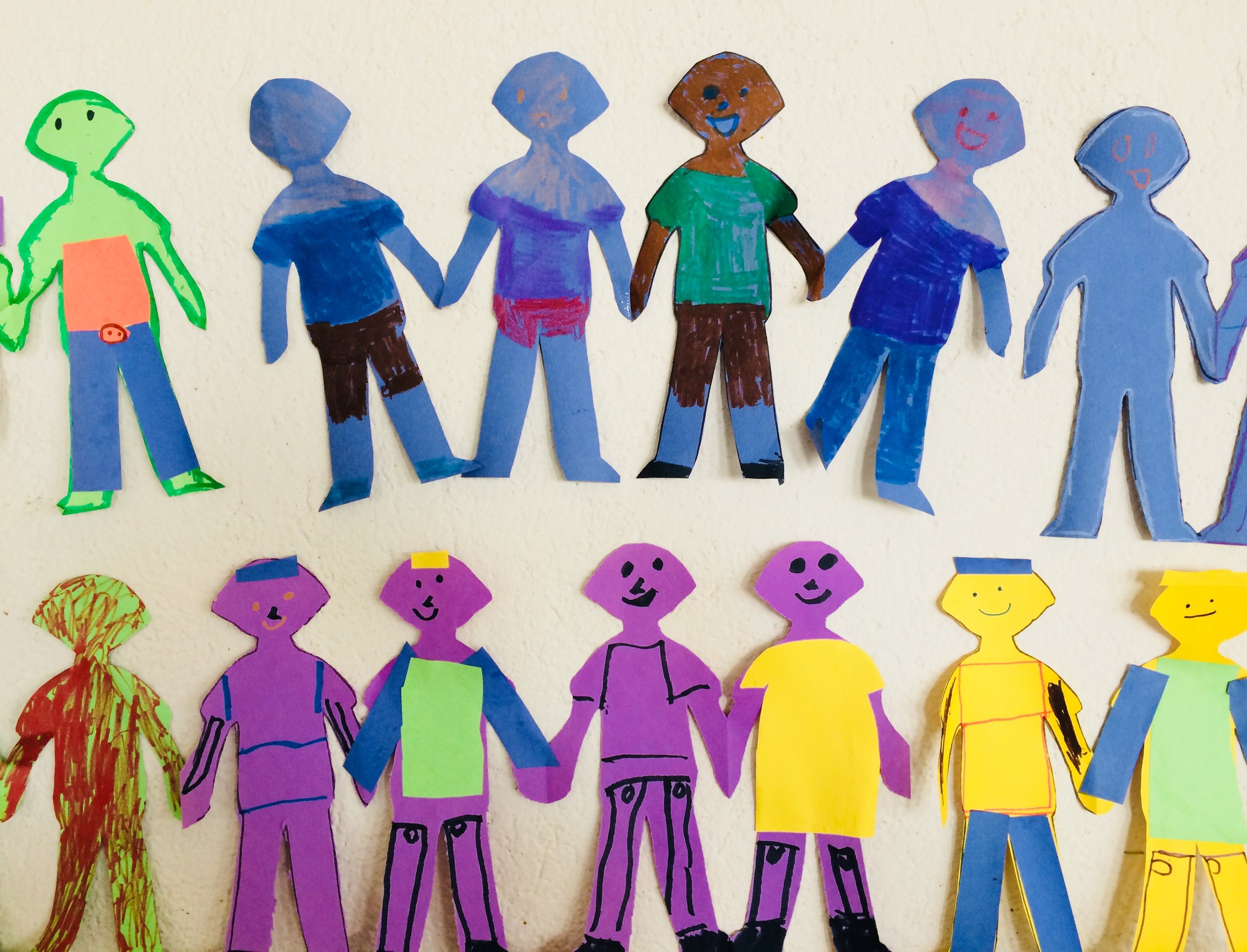 Paper dolls displaying the people of the world