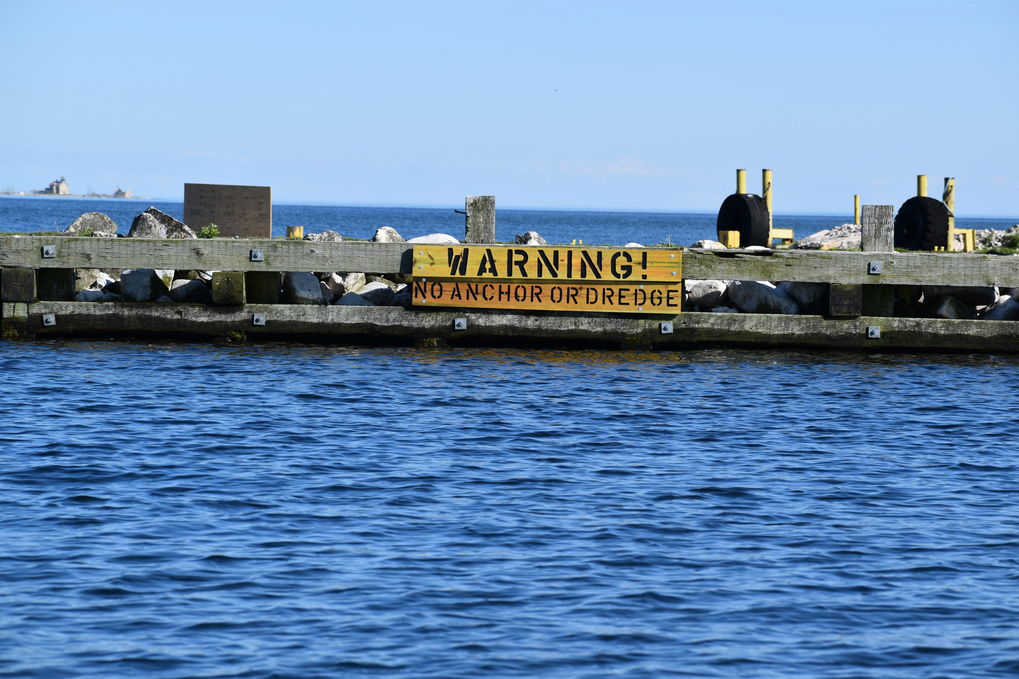 Warning Sign Plum Island Breakwall