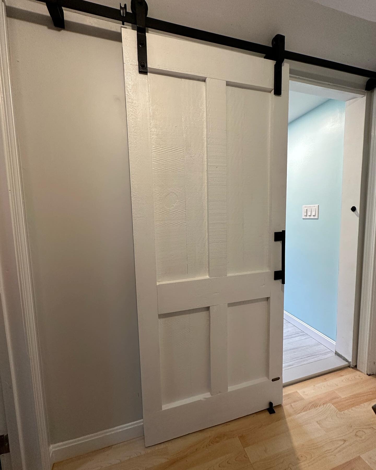 Chris and Anna of Reading were referred by an awesome tile expert named Tony who we did a barn door for years ago.

Anyway, this white door close matches the style of other doors in a tight upstairs hall and small bathroom entry that Tony renovated f