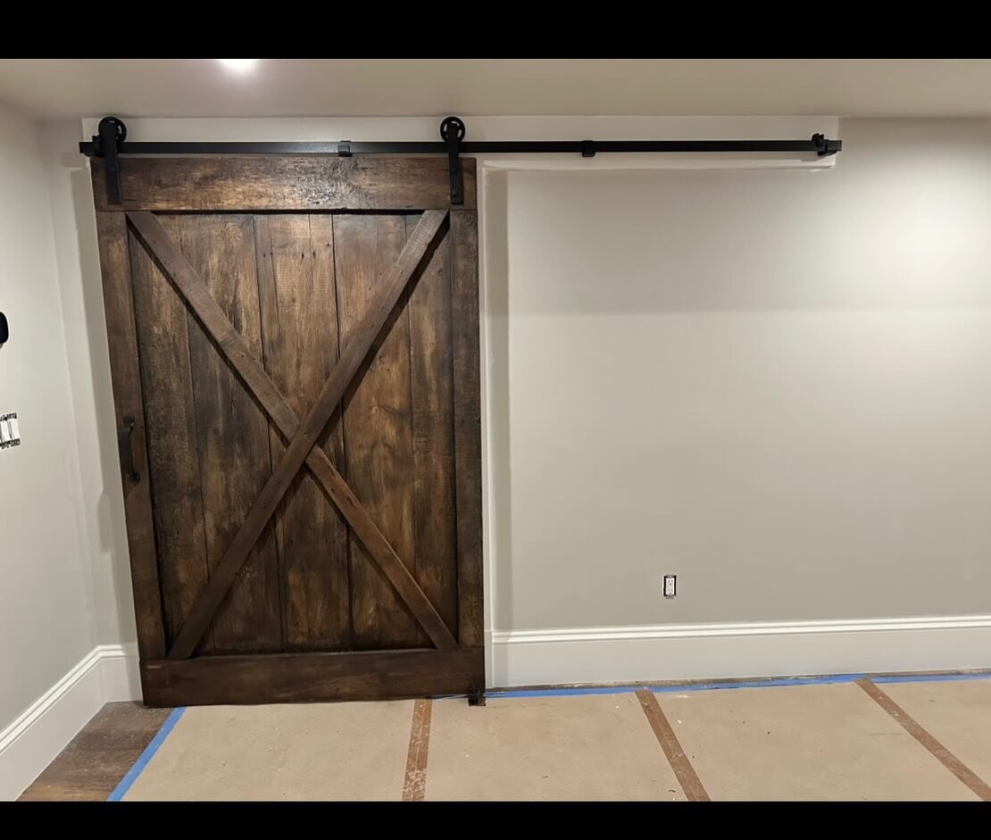 Alexa and Ben from Beckwith Builders, Inc. from Wolfeboro, NH contacted The Barndoorist for two rustic barn doors to be commissioned using aged gray boards coated in our brown wax. 

The beautiful, spacious home is at Alton Bay on Lake Winnipesaukee.