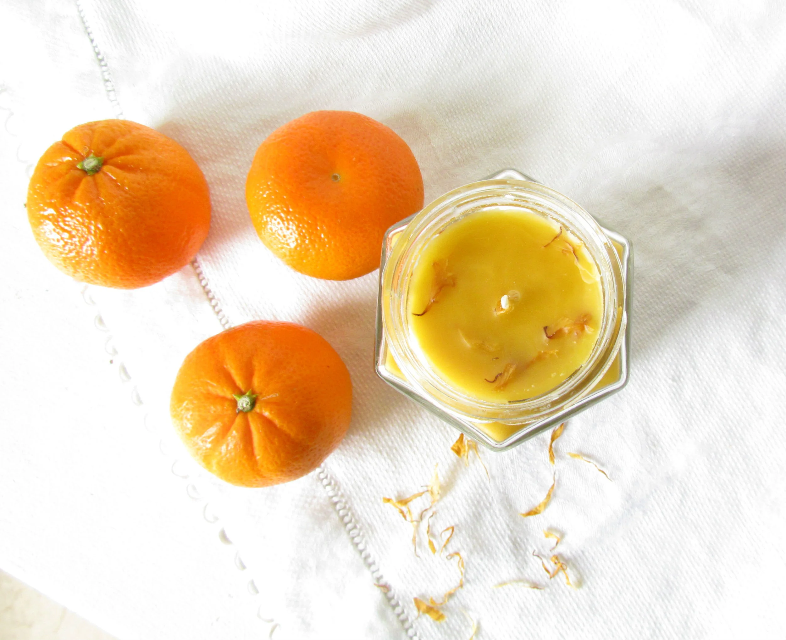 Uplifting tangerine calendula sheep milk beeswax candle