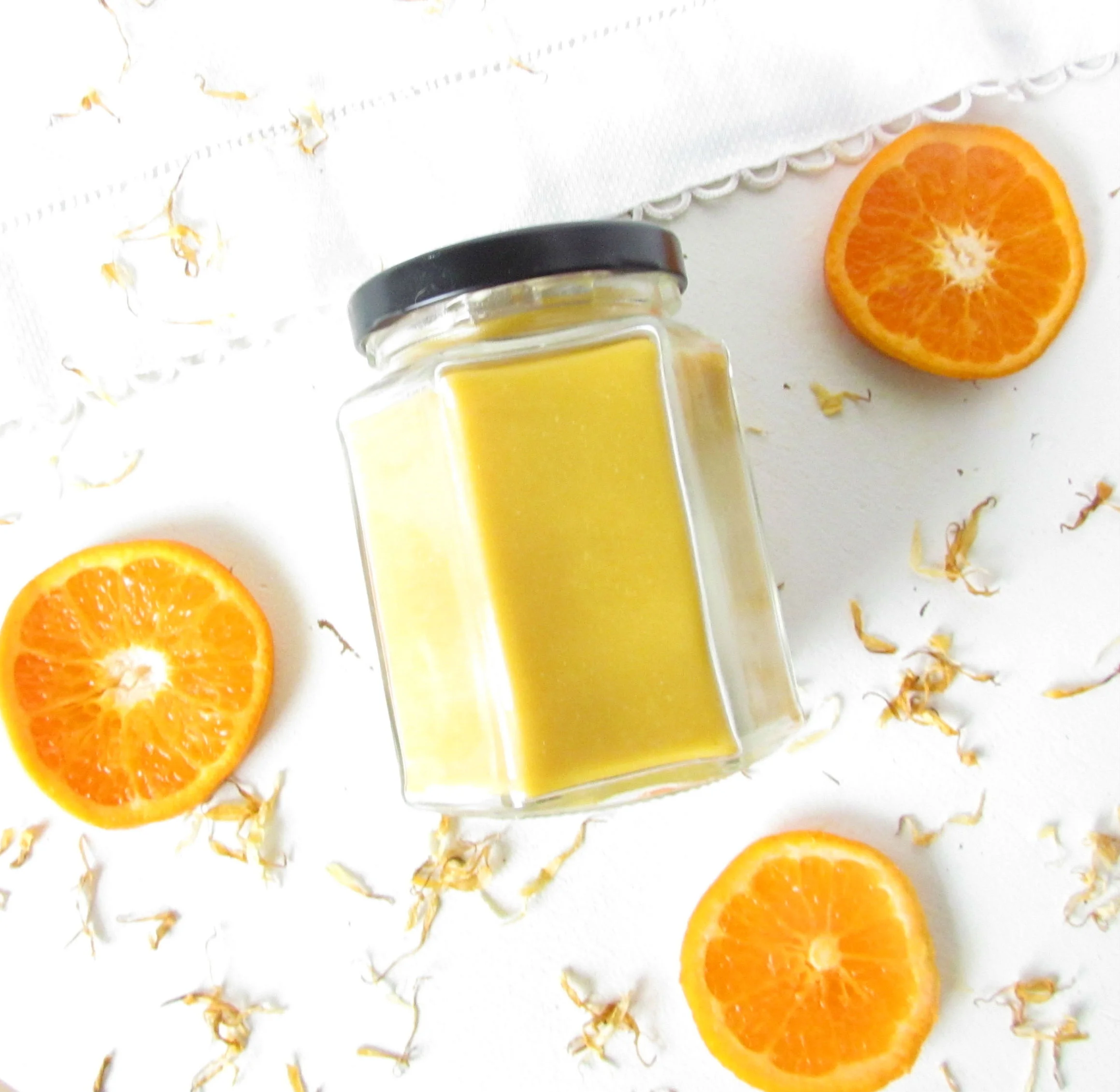 Uplifting tangerine calendula sheep milk beeswax candle