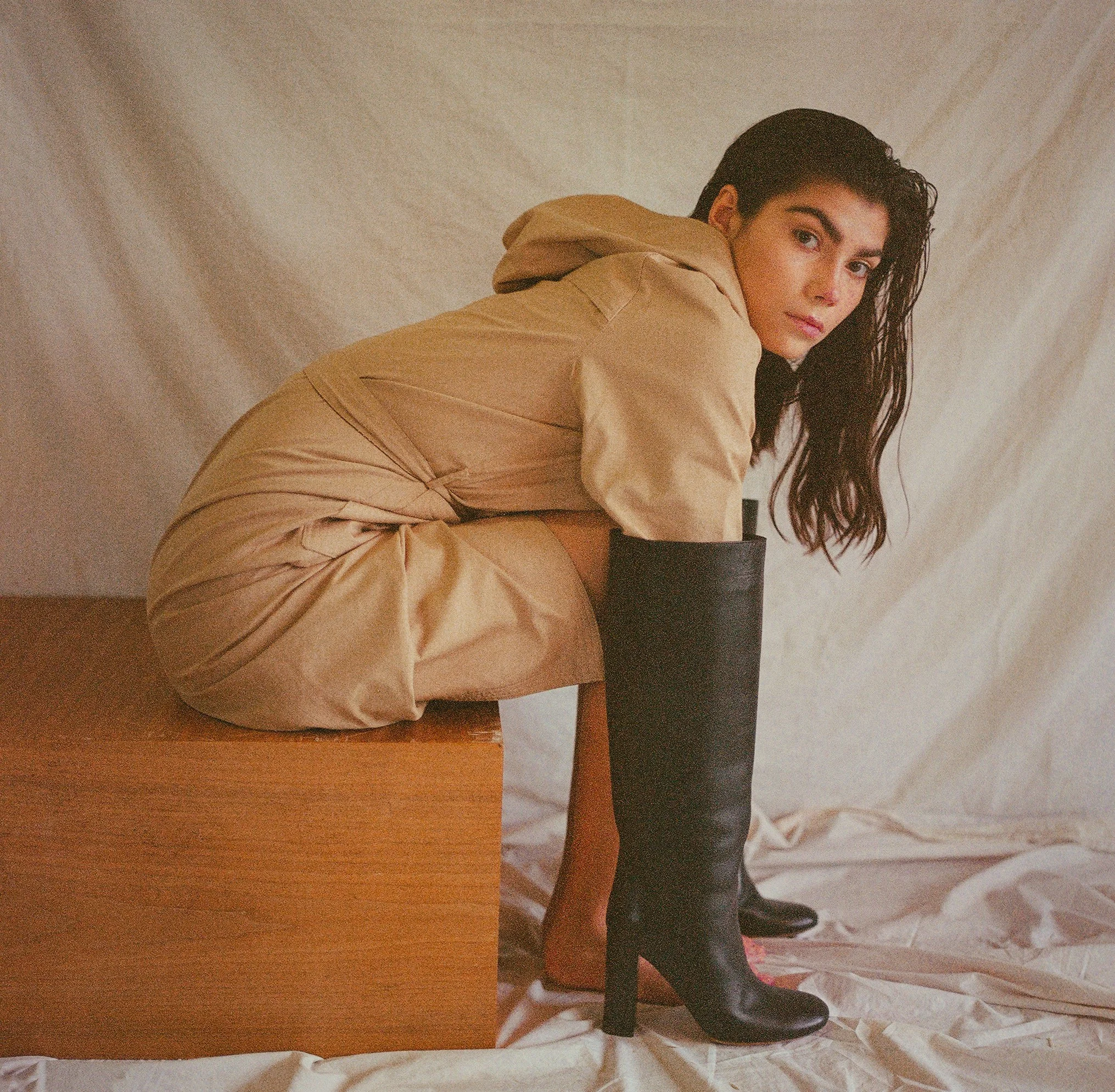 penelope hands in boots cropped.jpg